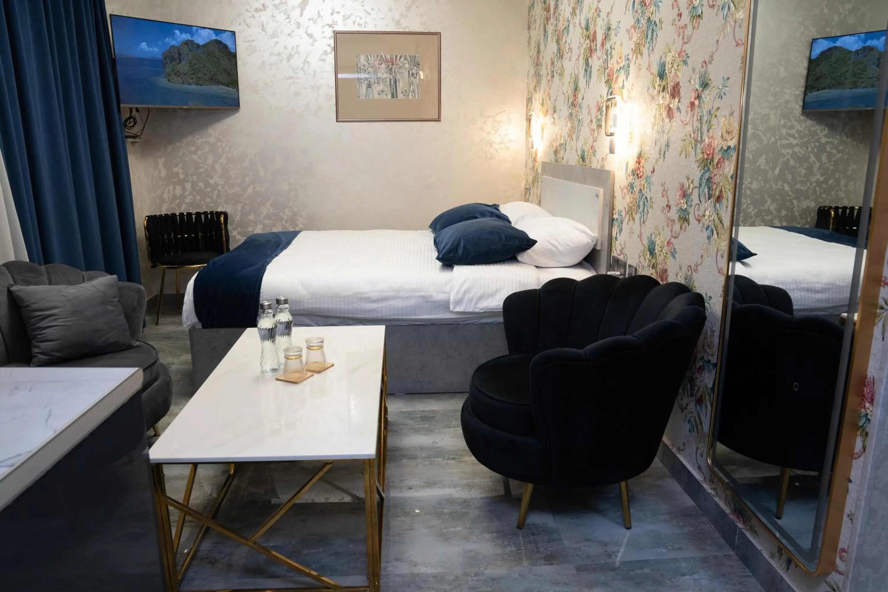 Photo of the whole room, Bed in Prime Suites Hotel