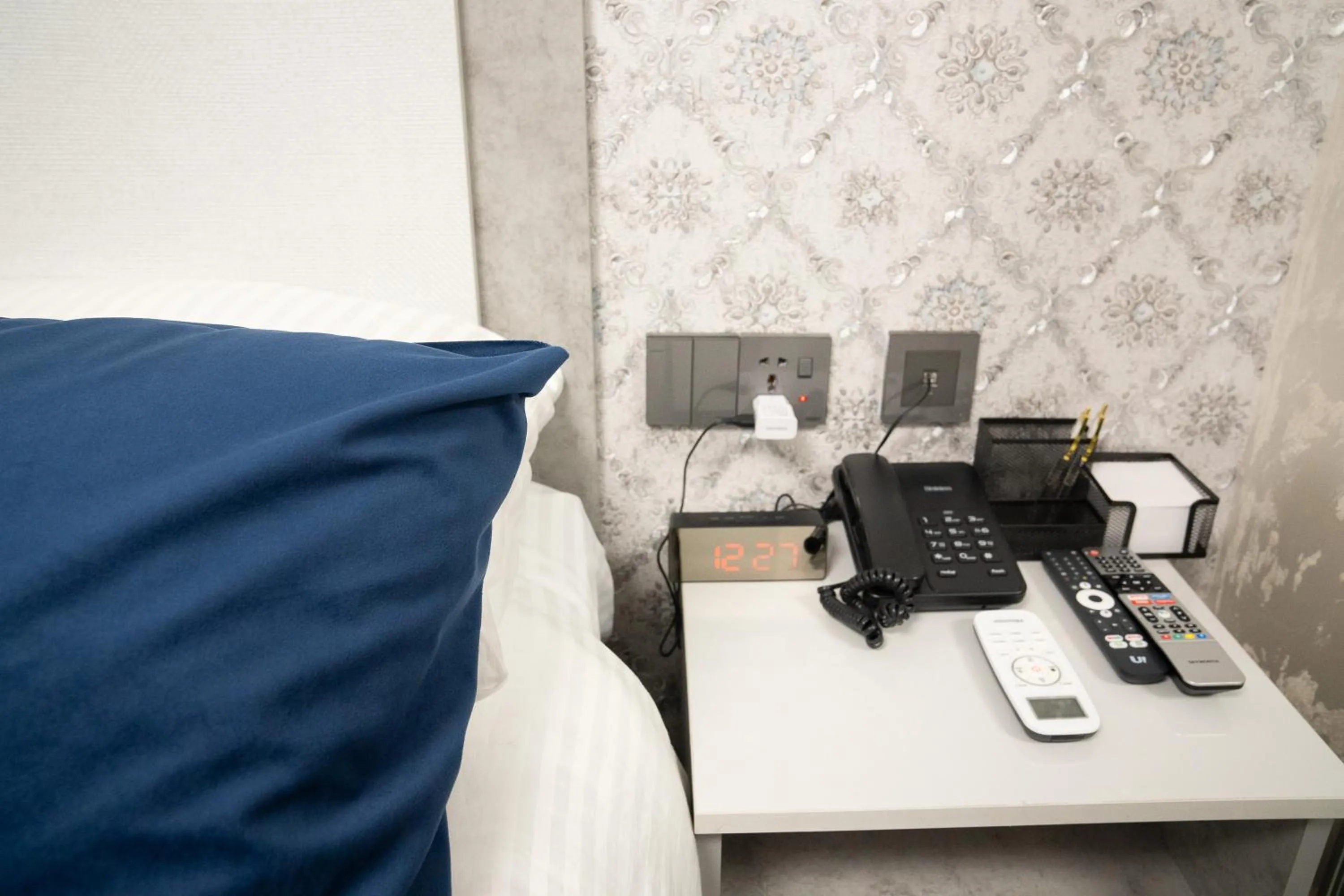 Bed in Prime Suites Hotel