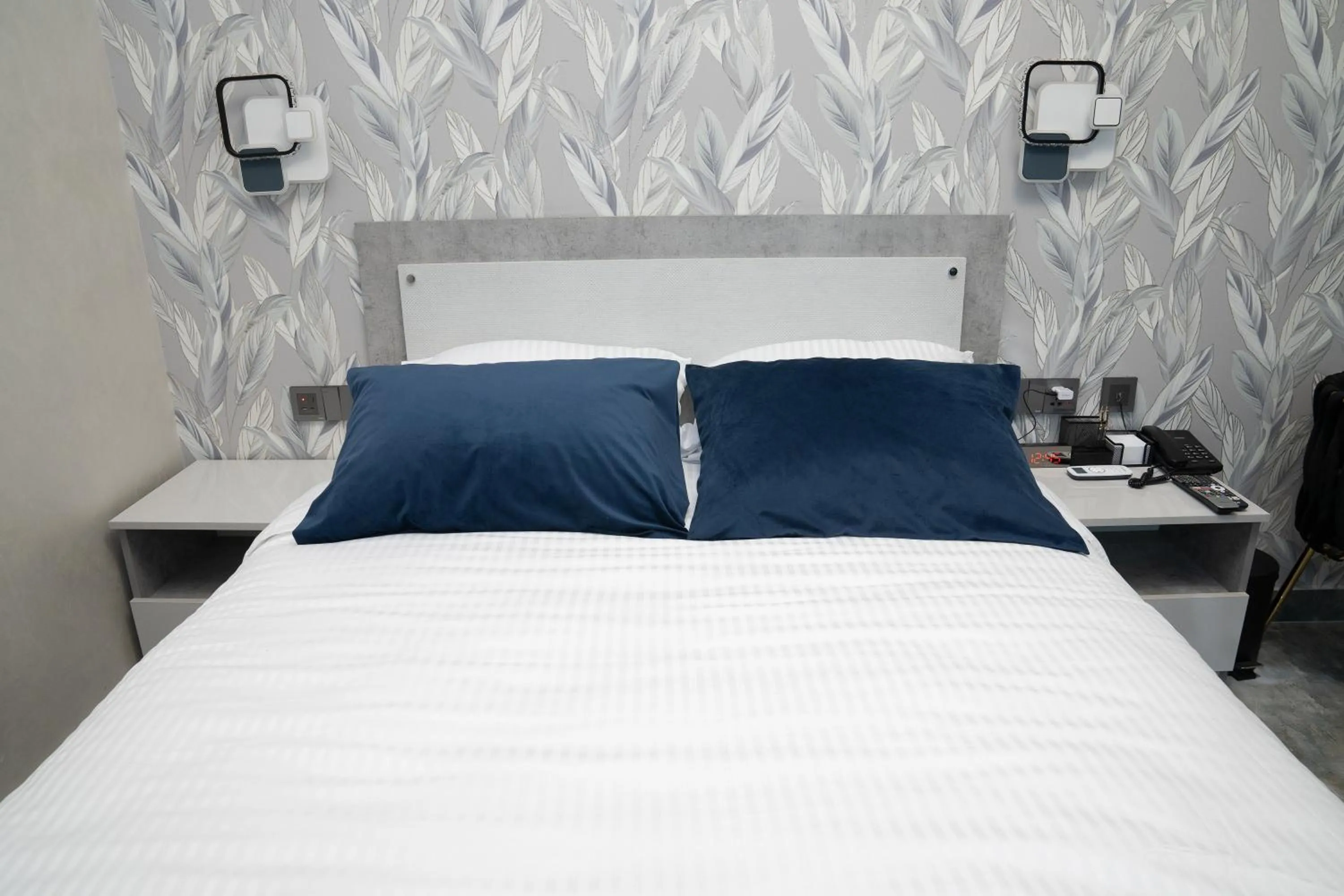 Bed in Prime Suites Hotel