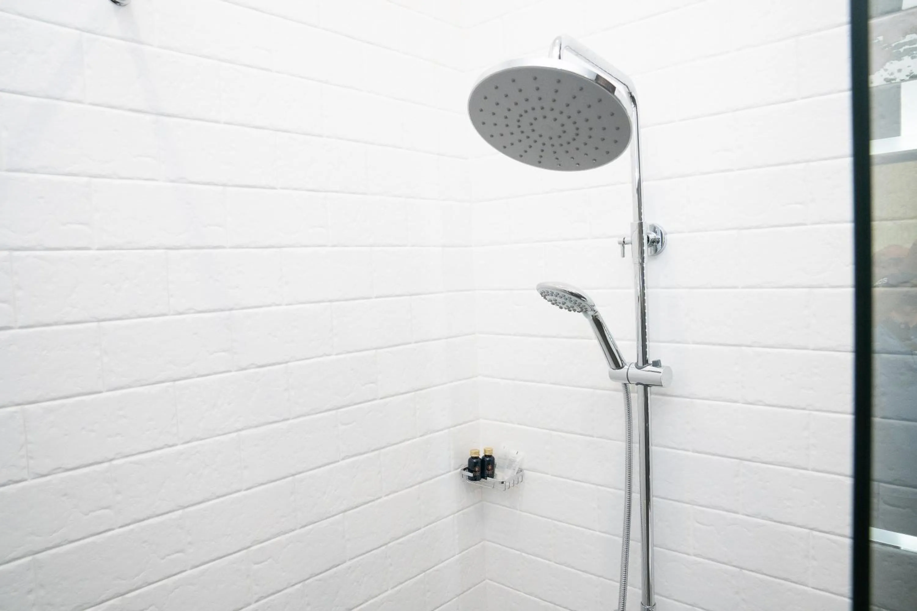 Shower in Prime Suites Hotel