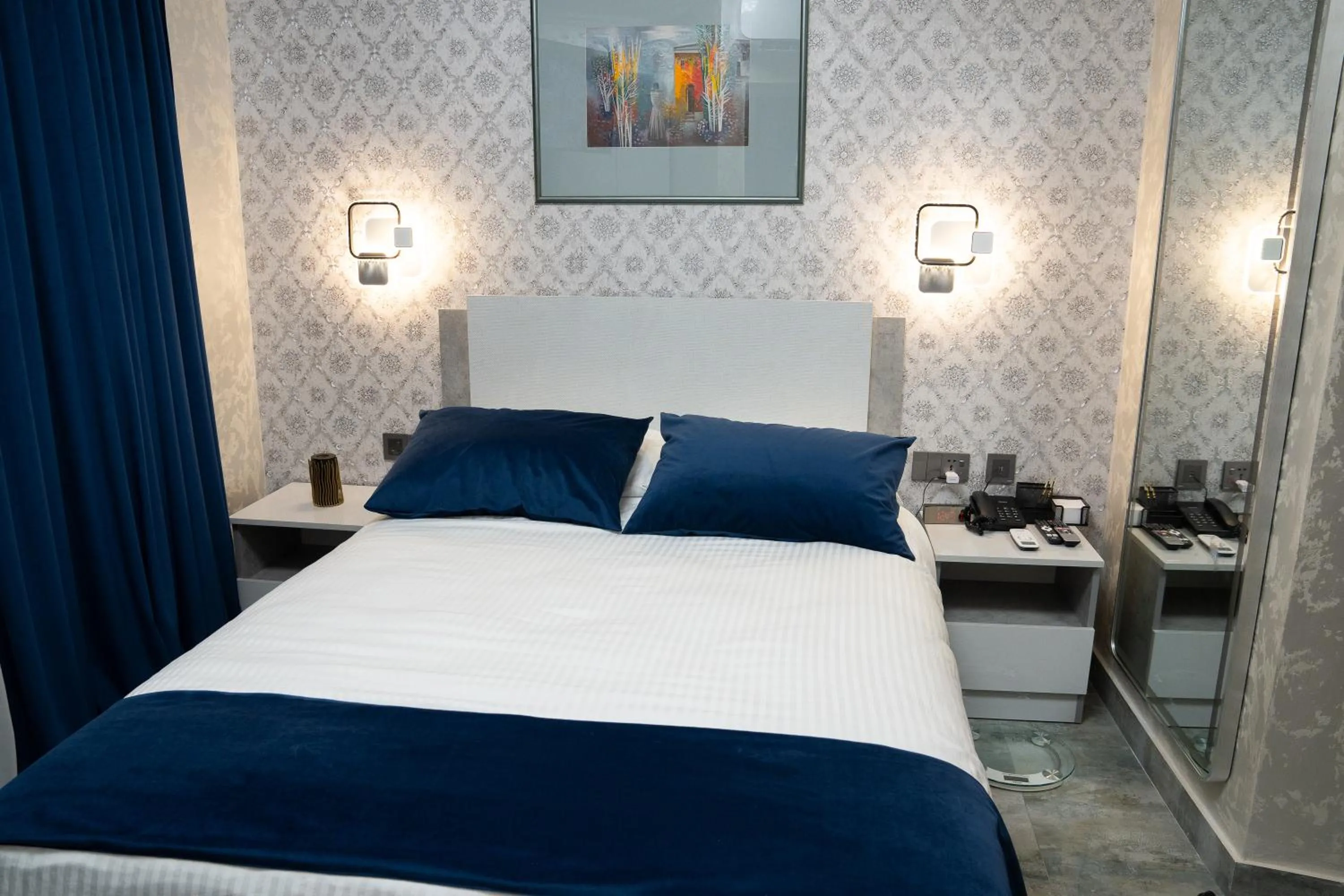 Bed in Prime Suites Hotel