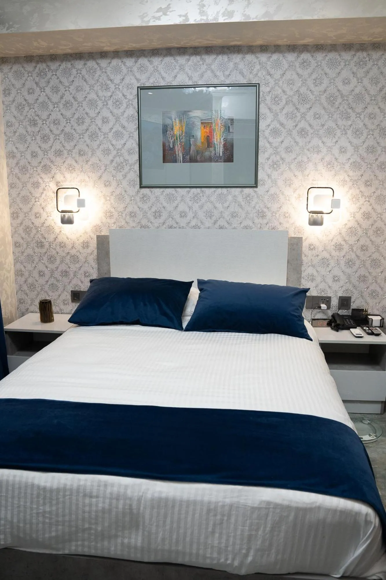 Bed in Prime Suites Hotel