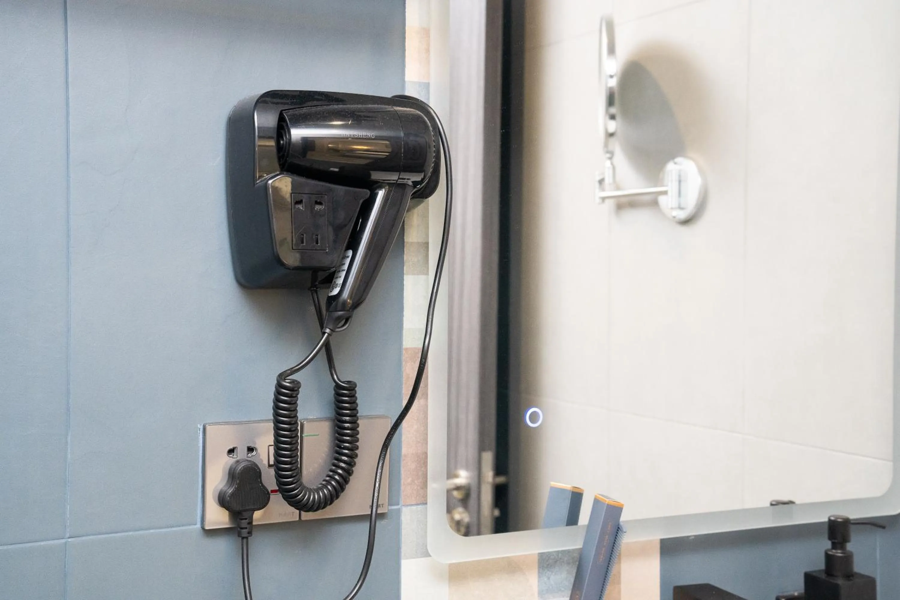 hair dryier in Prime Suites Hotel