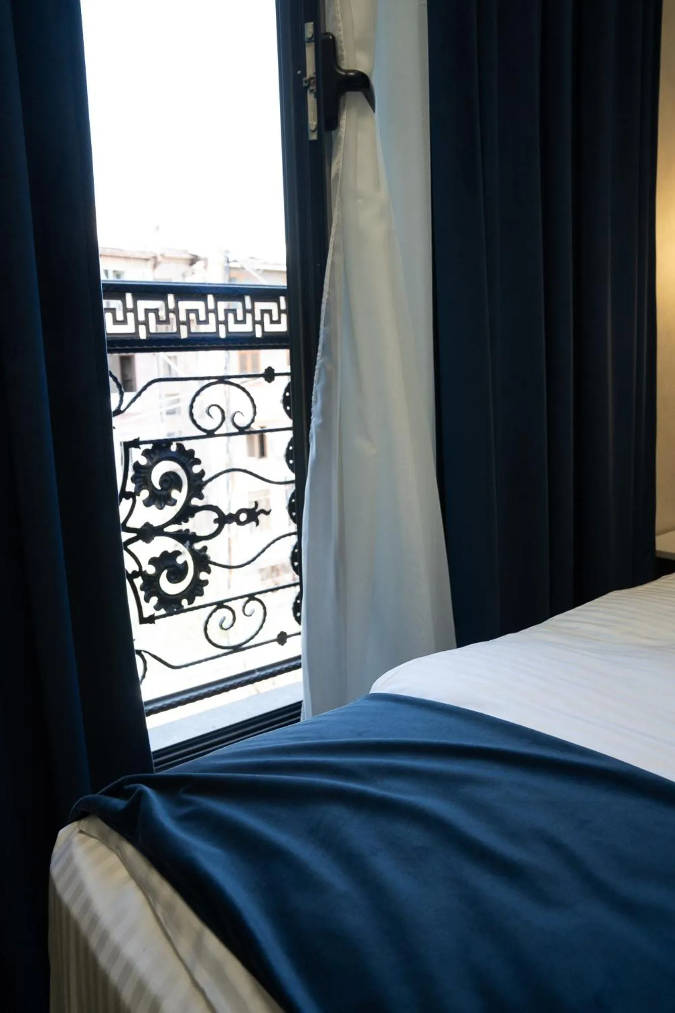 Balcony/Terrace, Bed in Prime Suites Hotel