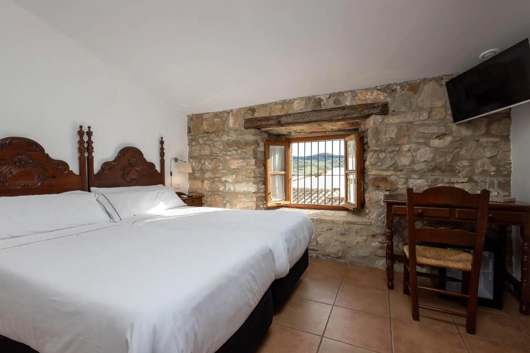 Property building, Bed in Tugasa Hotel y Apartamentos rurales La Posada