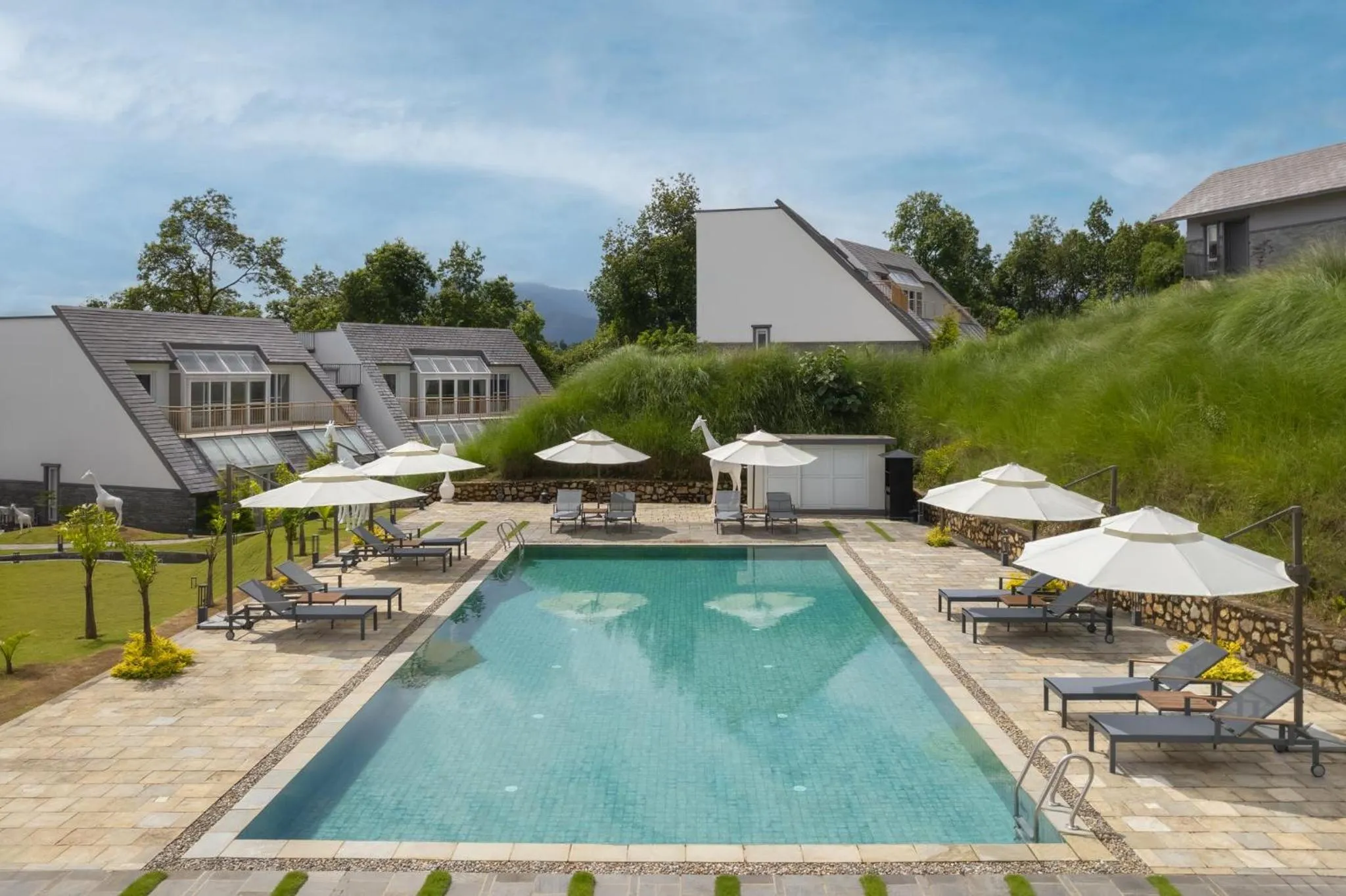 Swimming pool in Himalayan Hideaway Resort Pokhara, The Centara Collection