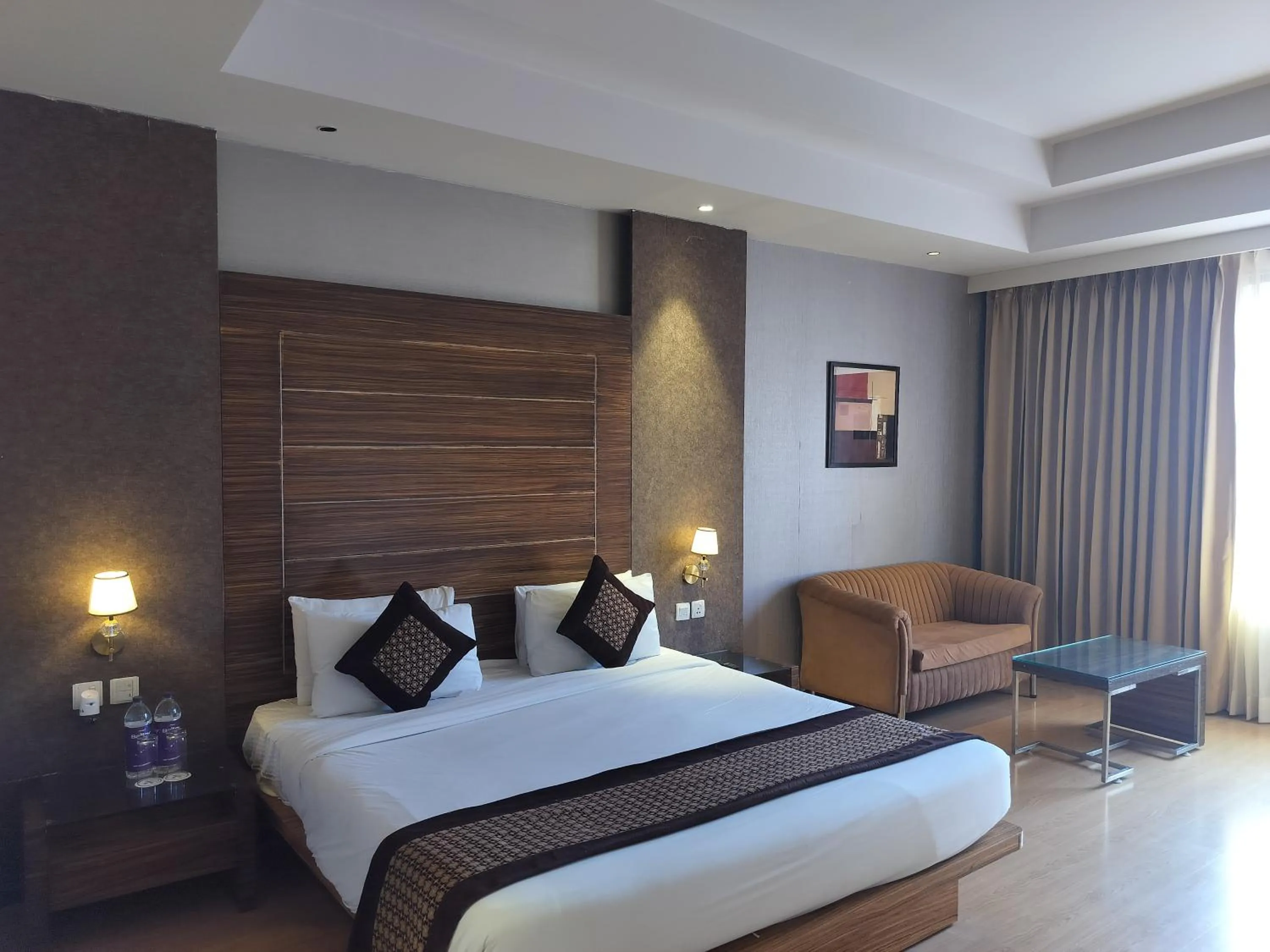 Photo of the whole room, Bed in Stellar Resorts By Bel-La Monde, Rajokri, Near IGI Airport, Delhi