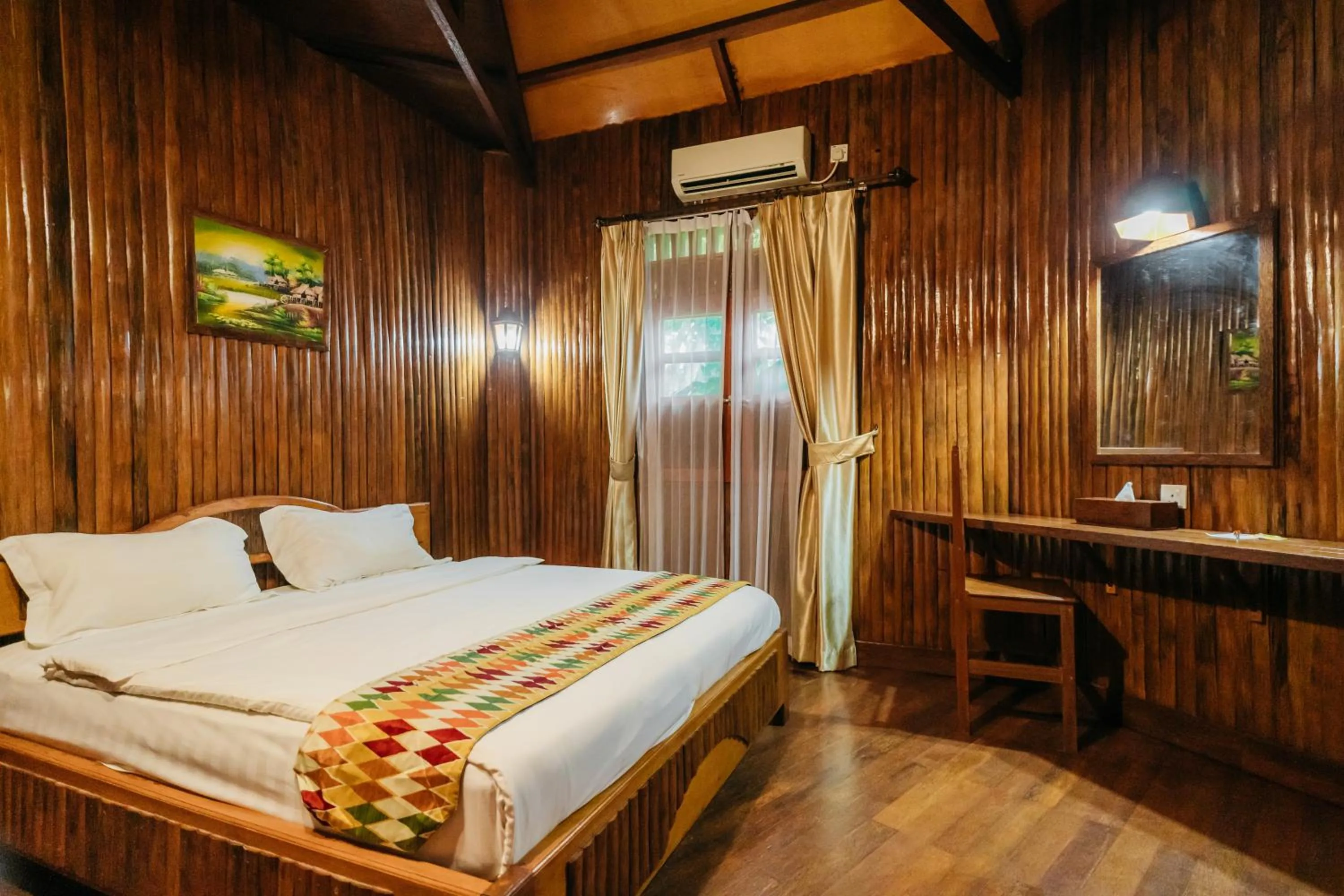 Bed in de Bintan Villa