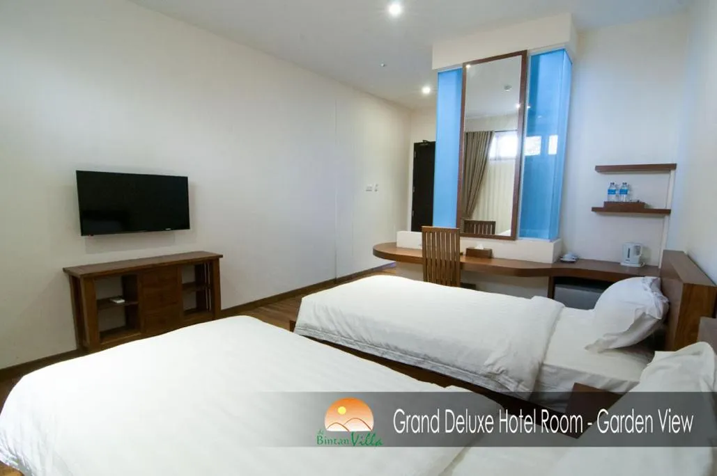 Bed in de Bintan Villa
