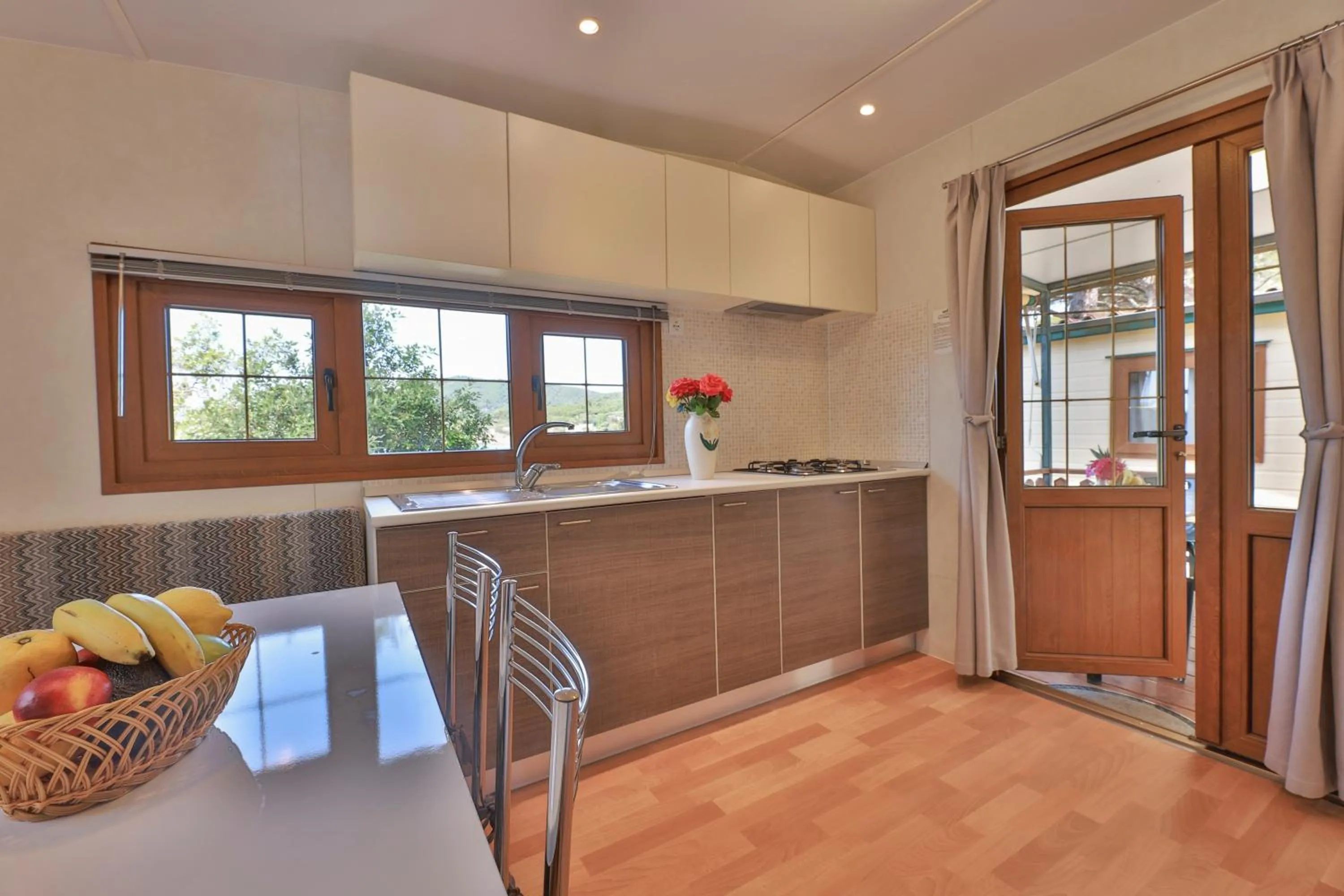 Kitchen or kitchenette in Camping Village Le Calanchiole