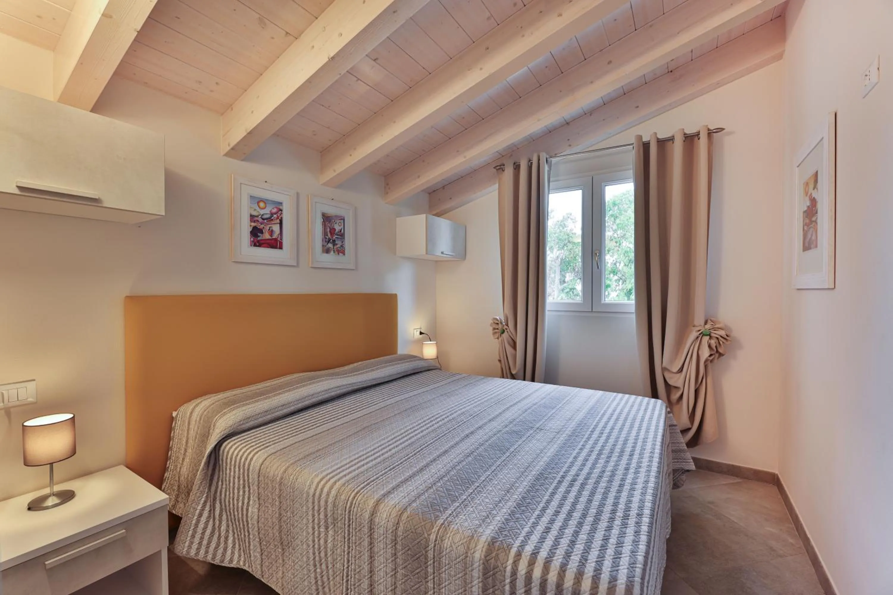 Bed in Camping Village Le Calanchiole