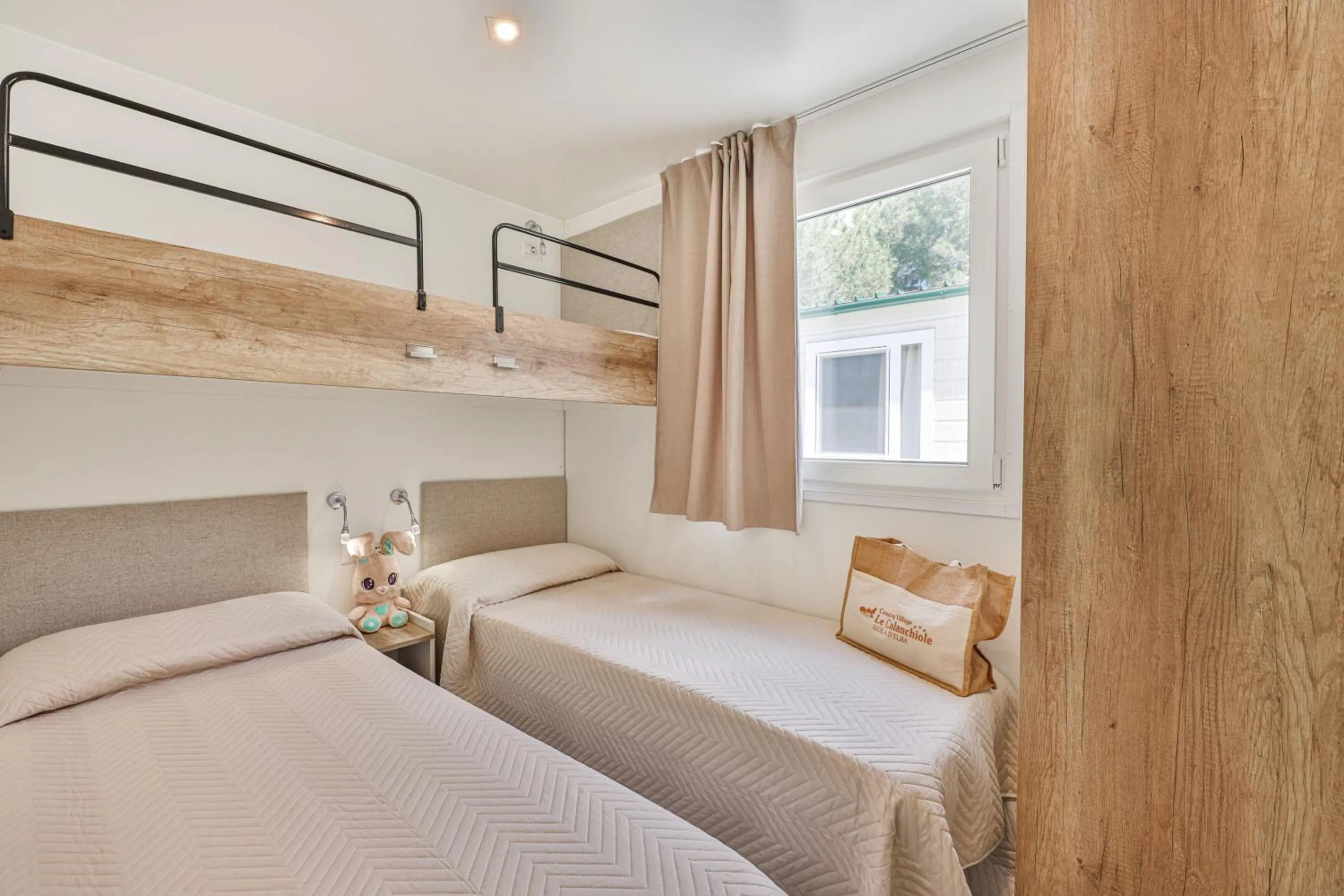 Bed in Camping Village Le Calanchiole