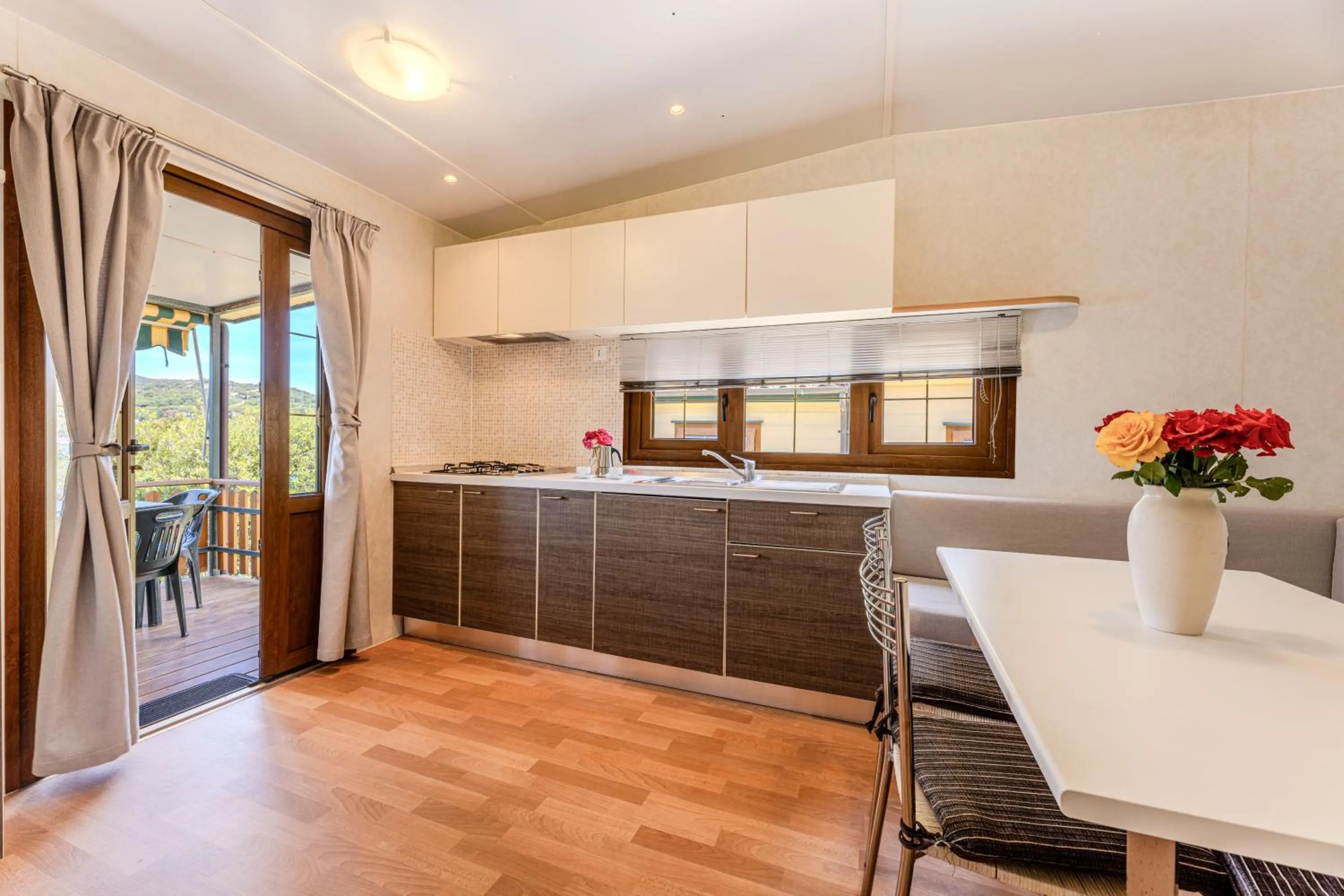 Kitchen or kitchenette in Camping Village Le Calanchiole