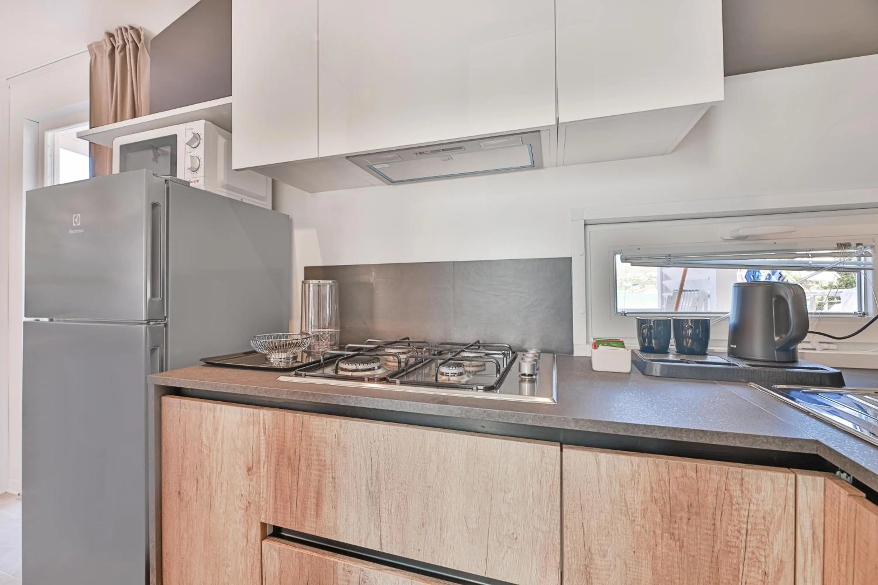 Kitchen or kitchenette in Camping Village Le Calanchiole
