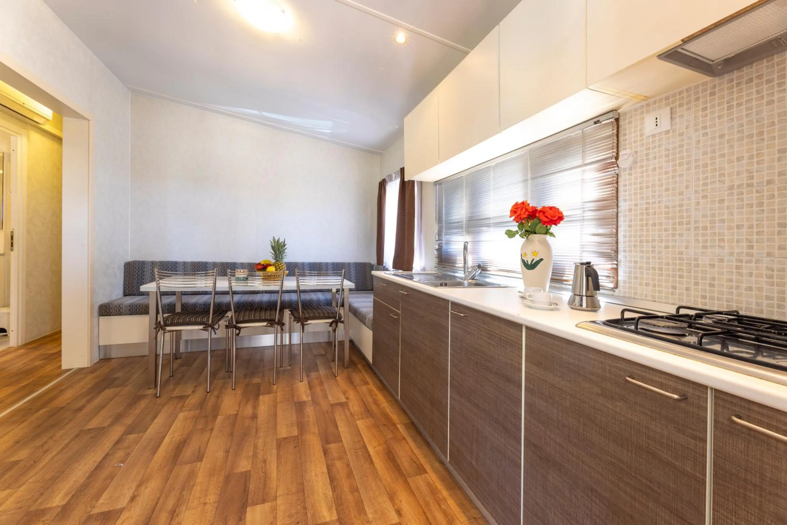 Kitchen or kitchenette in Camping Village Le Calanchiole