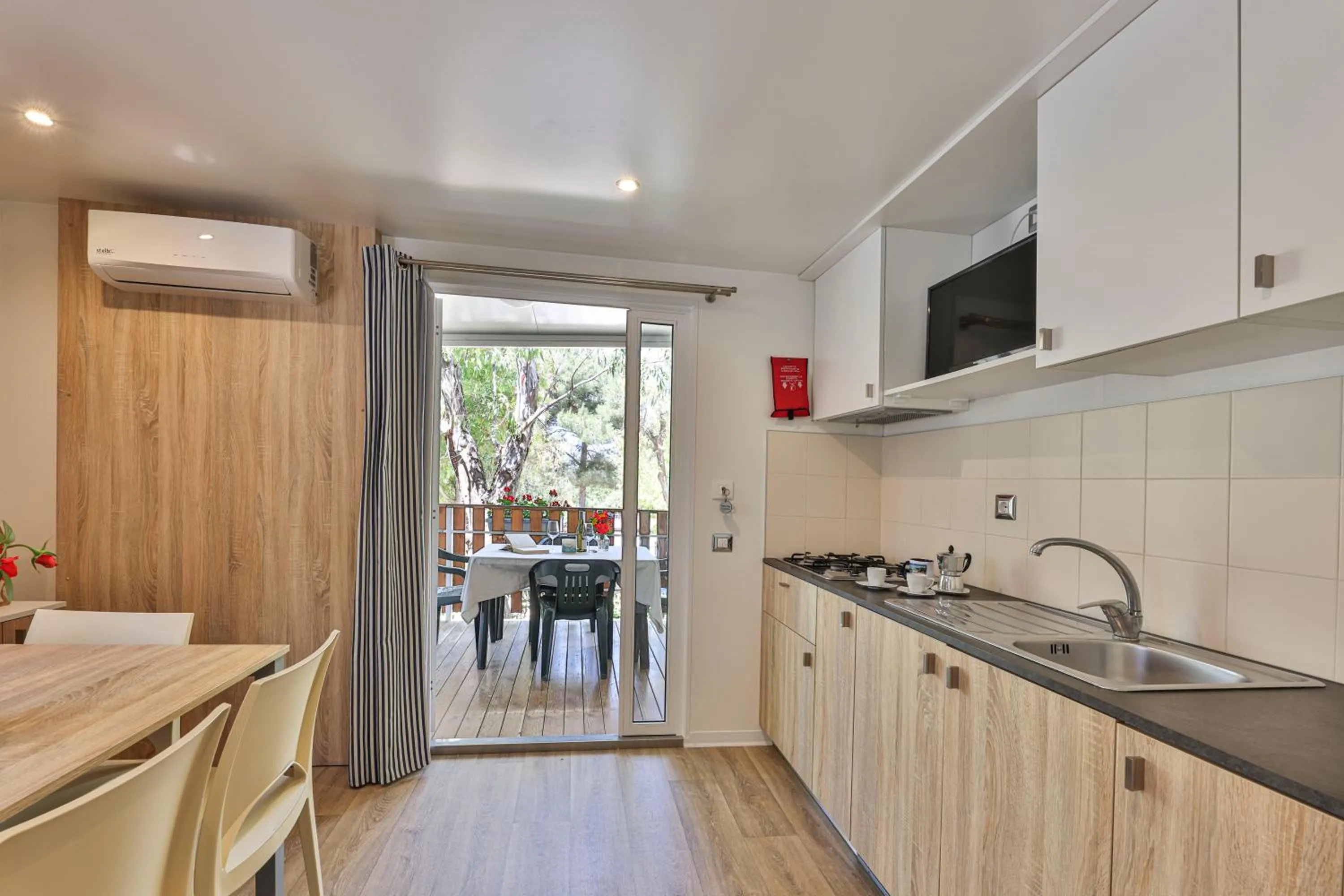 Kitchen or kitchenette in Camping Village Le Calanchiole
