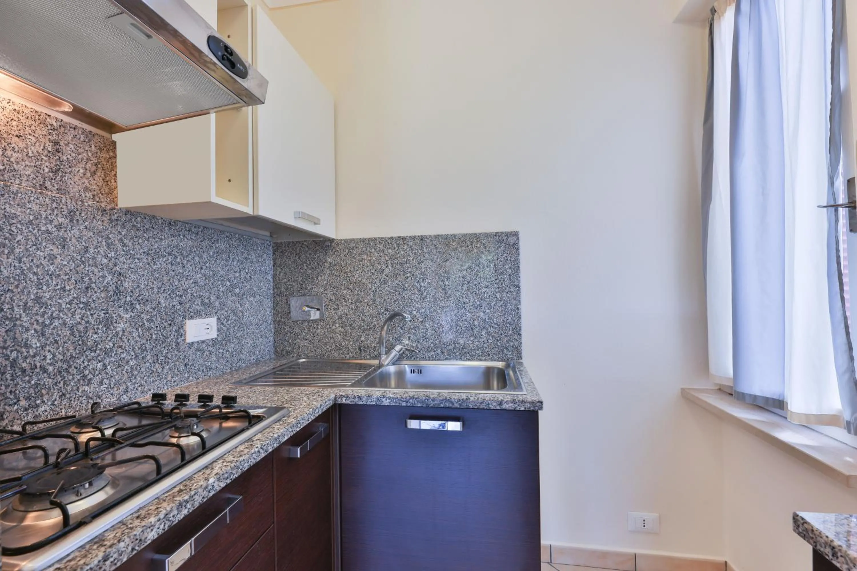 Kitchen or kitchenette in Camping Village Le Calanchiole