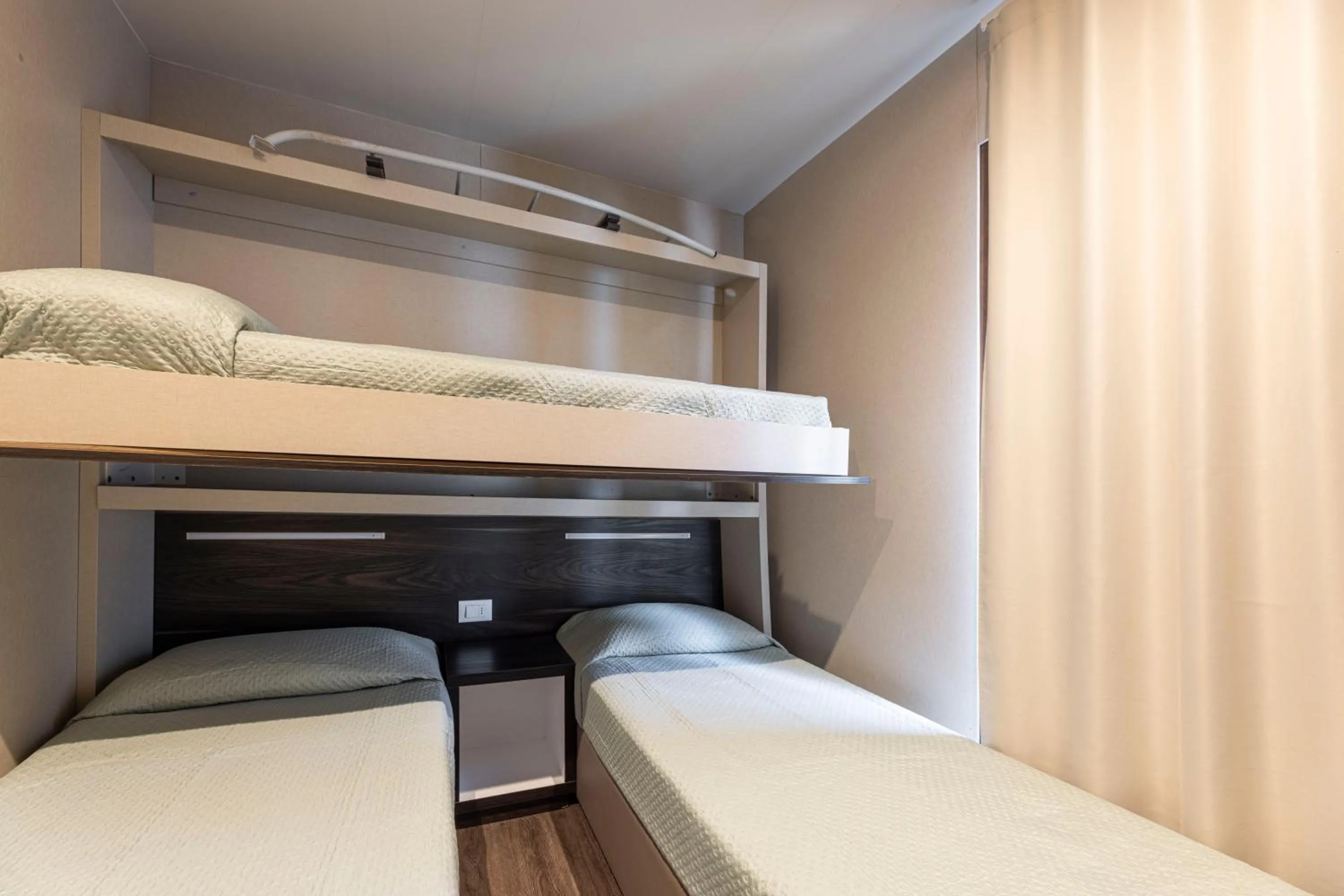 Bed in Camping Village Le Calanchiole