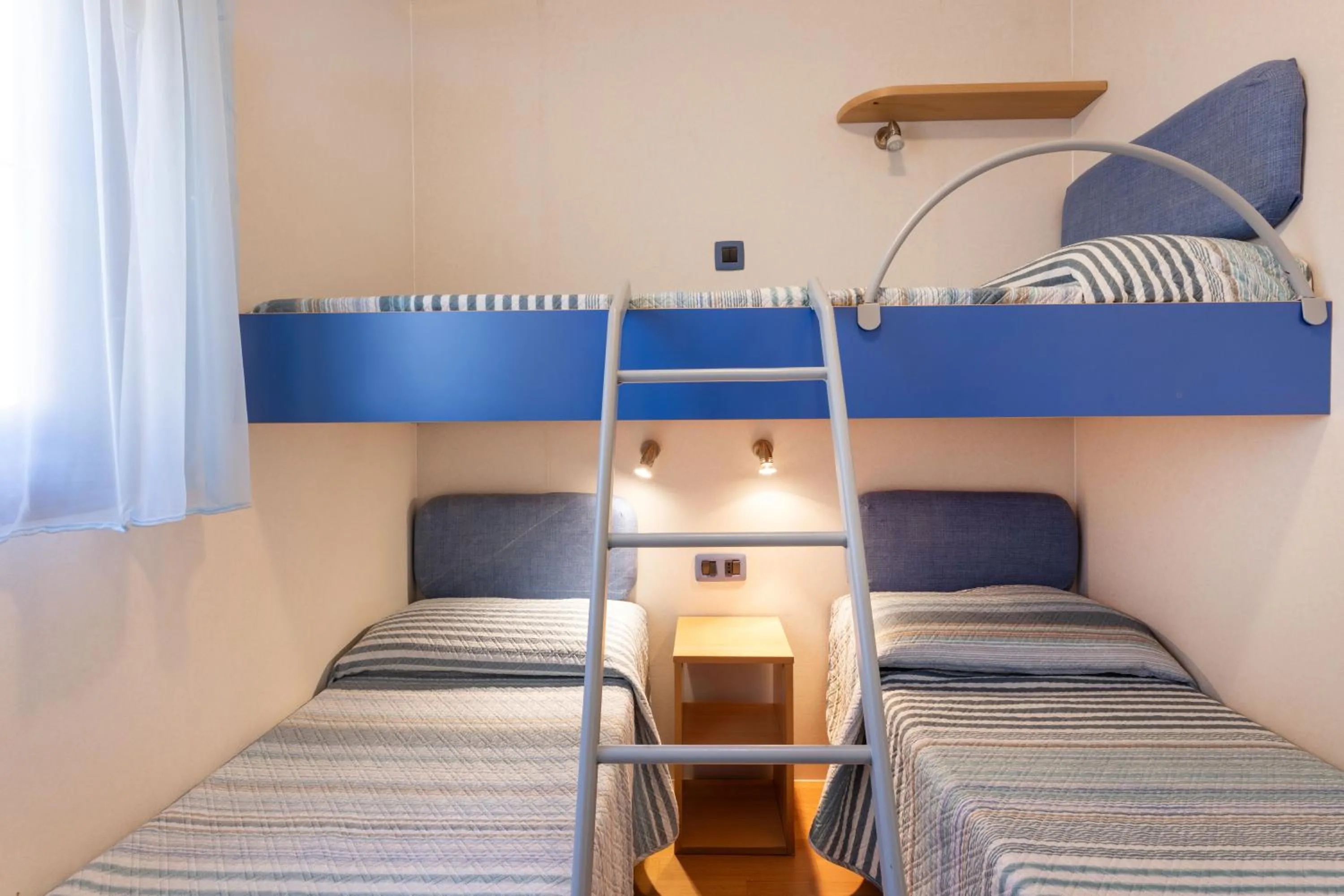Bed in Camping Village Le Calanchiole