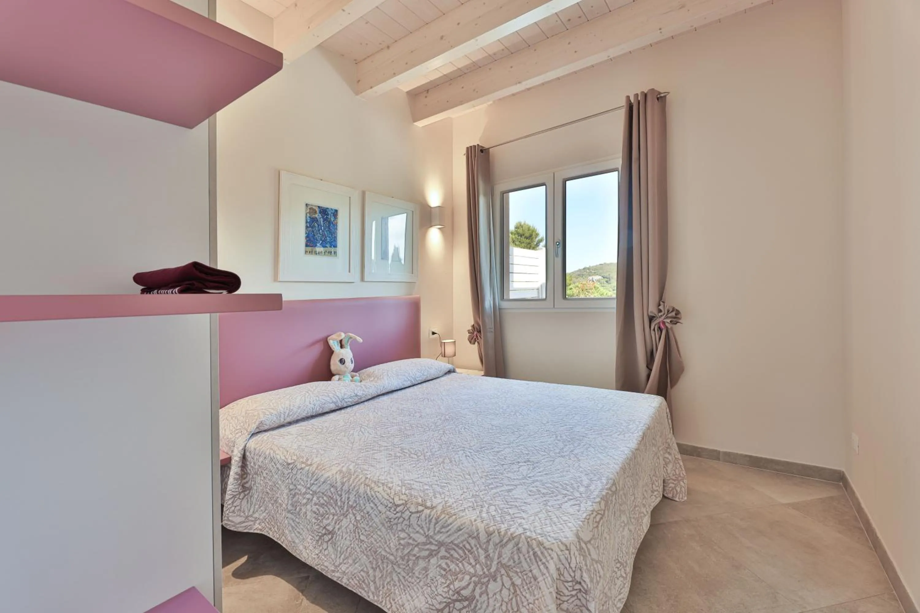 Bed in Camping Village Le Calanchiole
