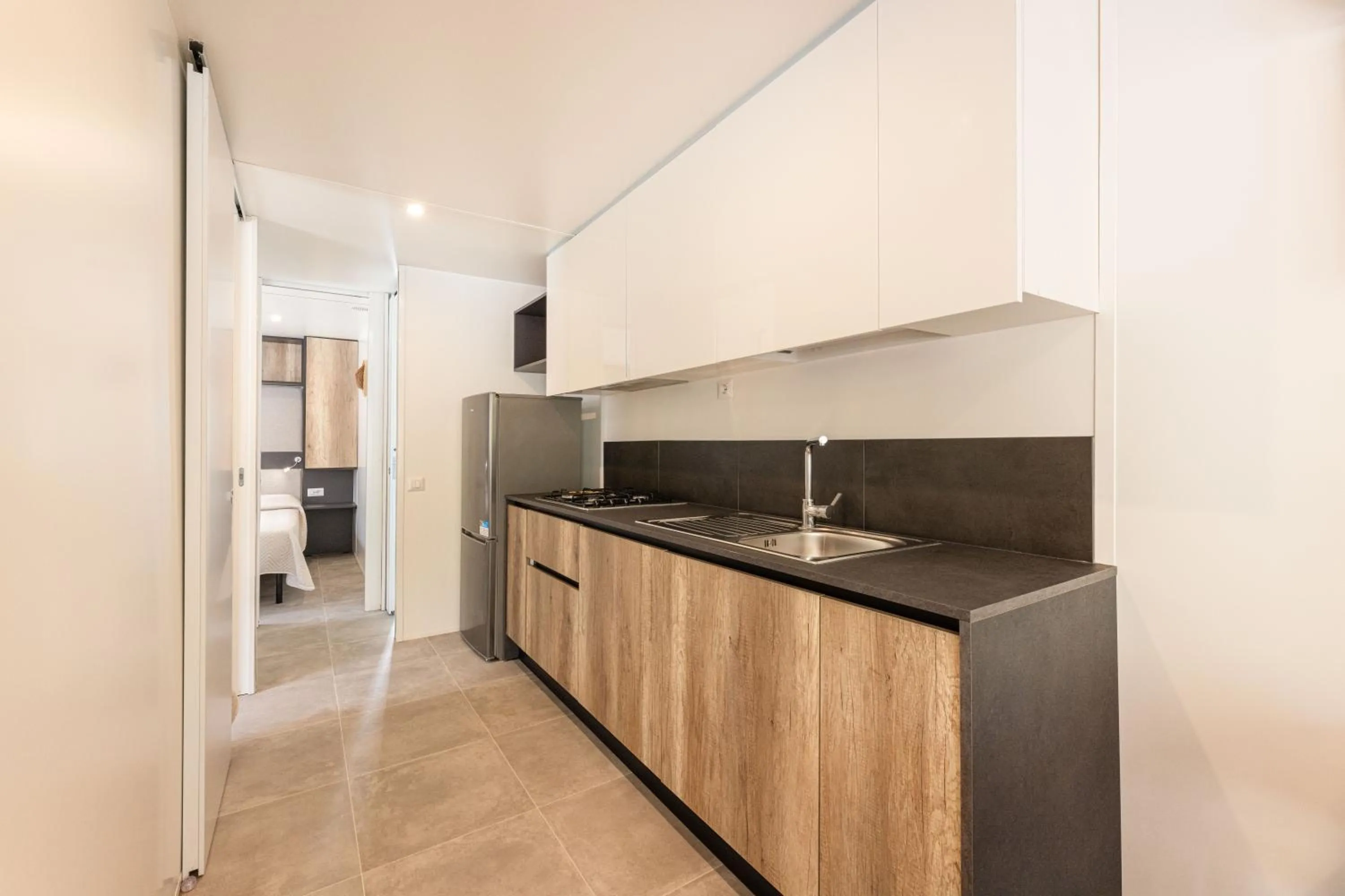 Kitchen or kitchenette in Camping Village Le Calanchiole