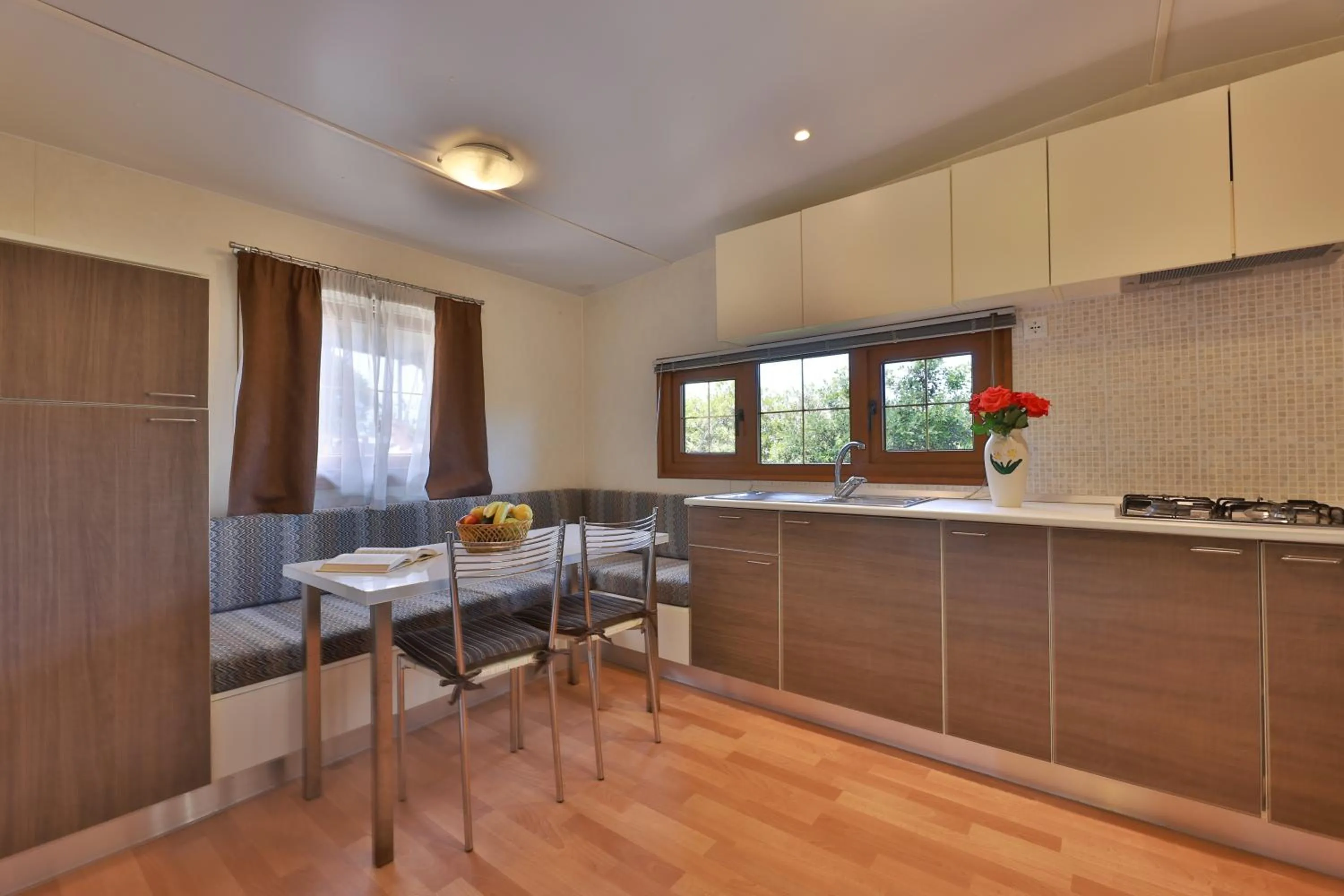 Kitchen or kitchenette in Camping Village Le Calanchiole