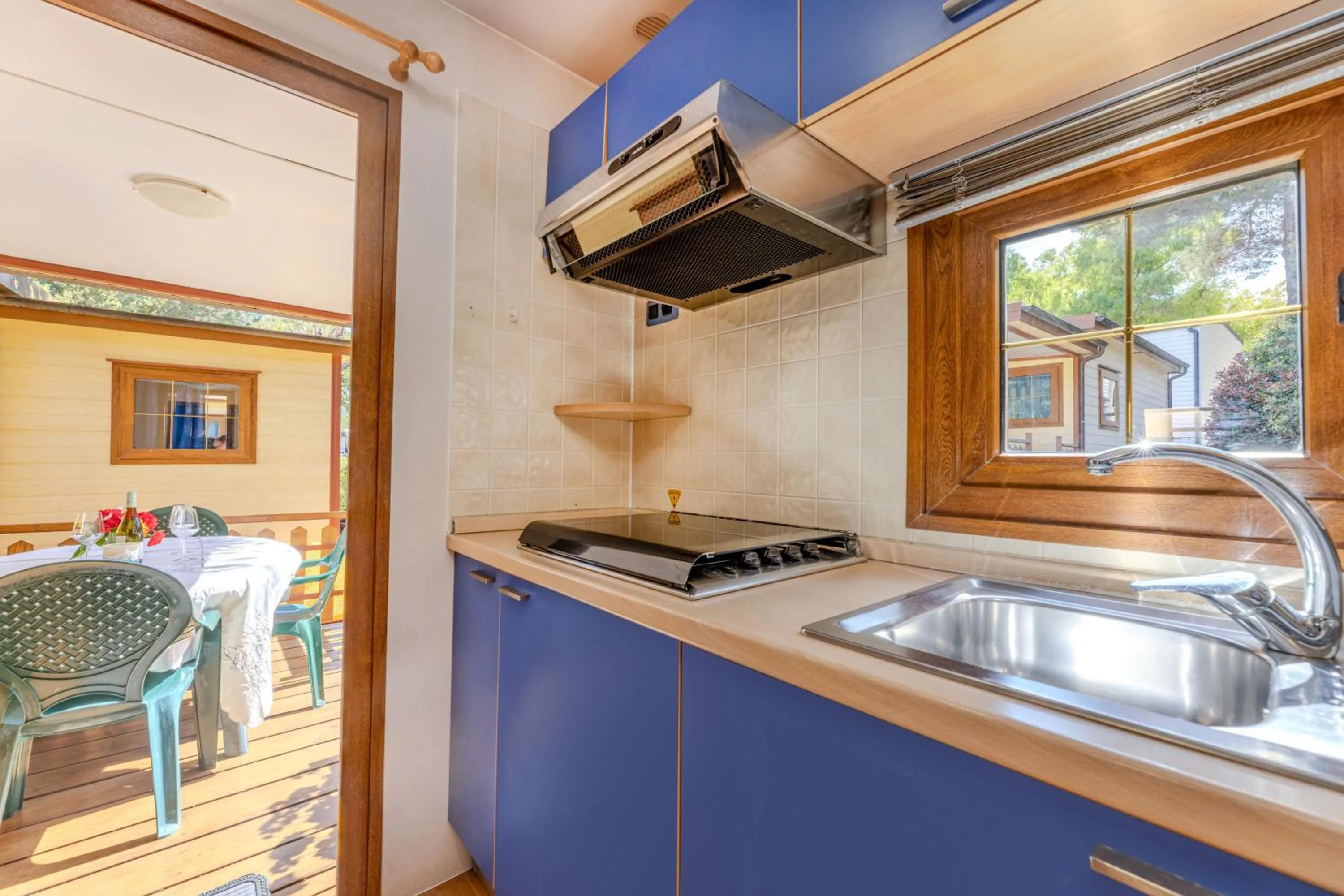 Kitchen or kitchenette in Camping Village Le Calanchiole