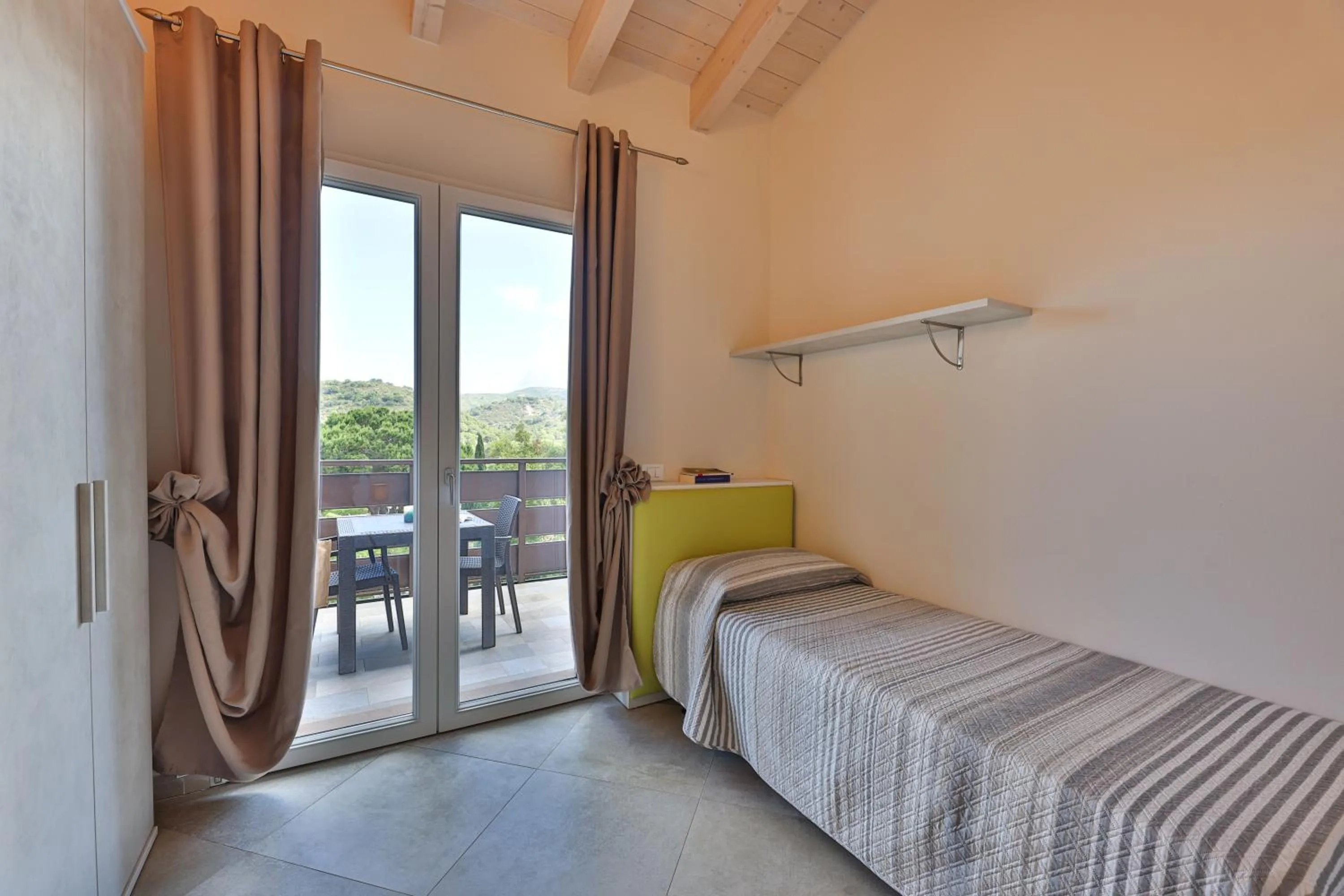 Bed in Camping Village Le Calanchiole