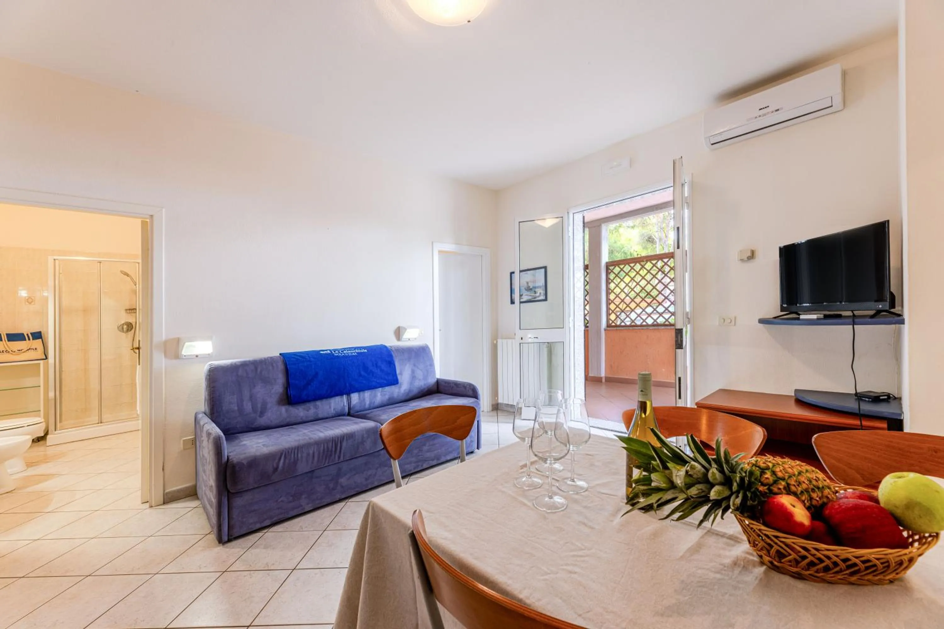 Communal lounge/ TV room in Camping Village Le Calanchiole