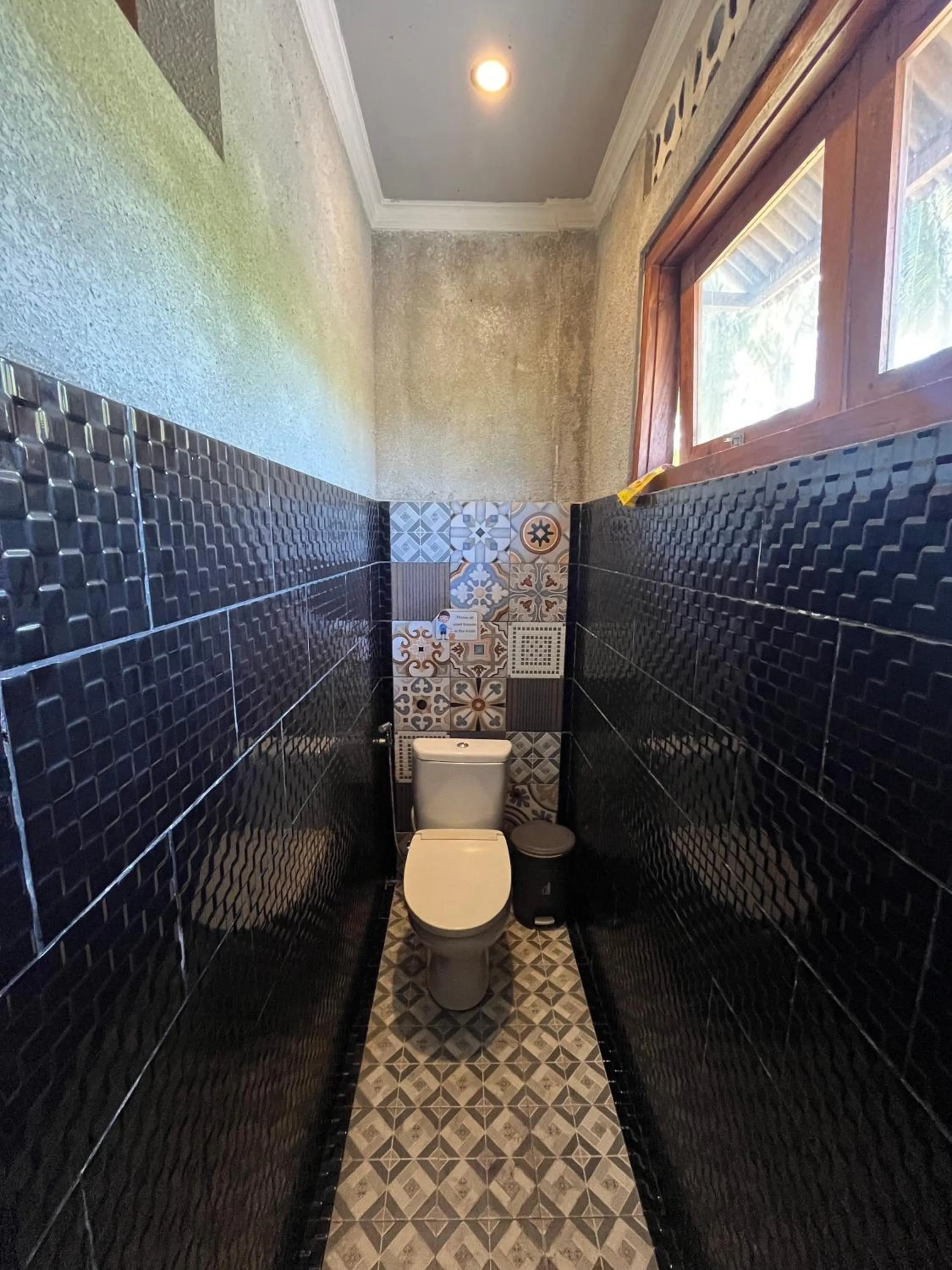 Toilet in Waras Villa