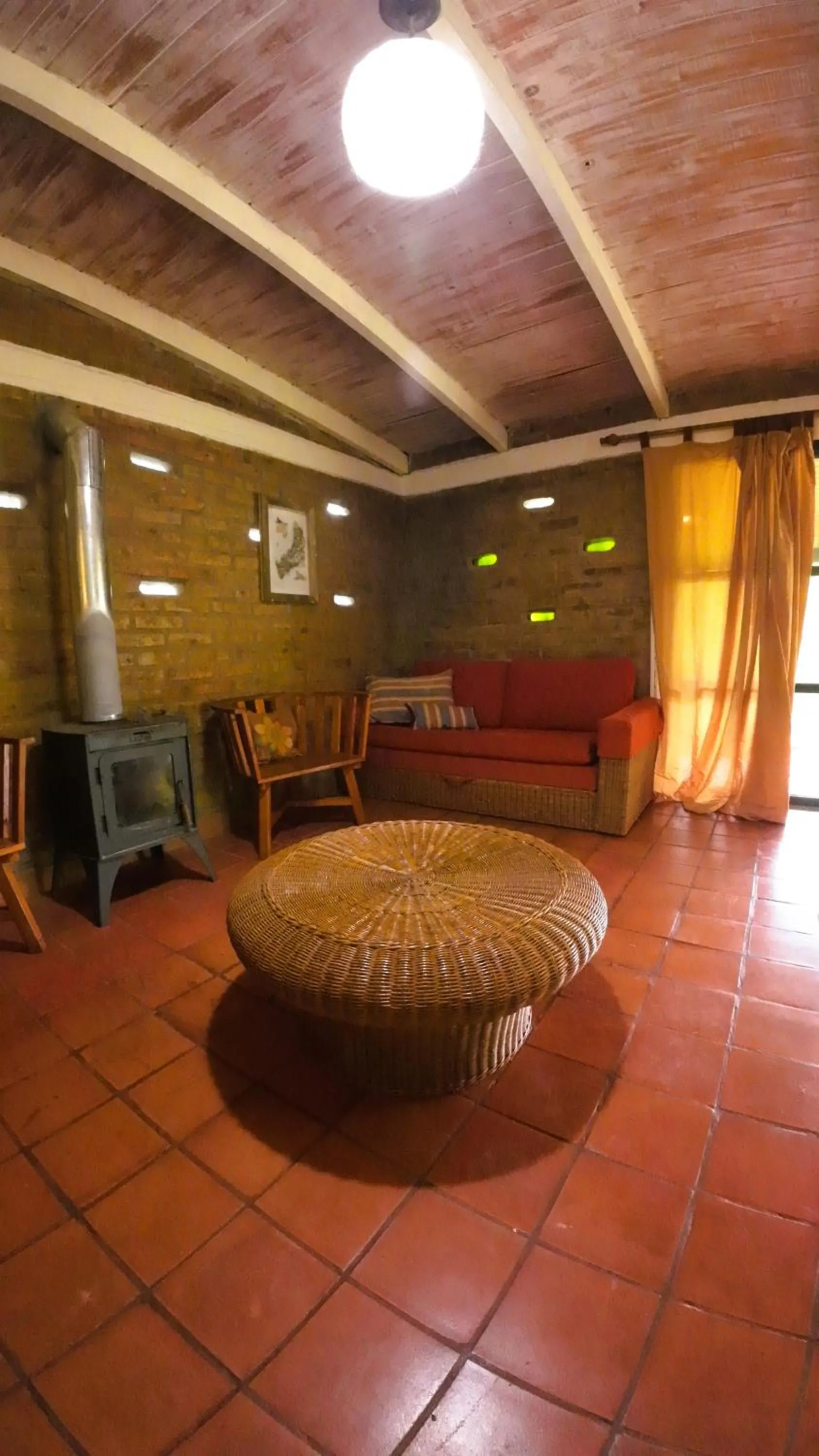 Living room in Granja La Lechuza Ecolodge