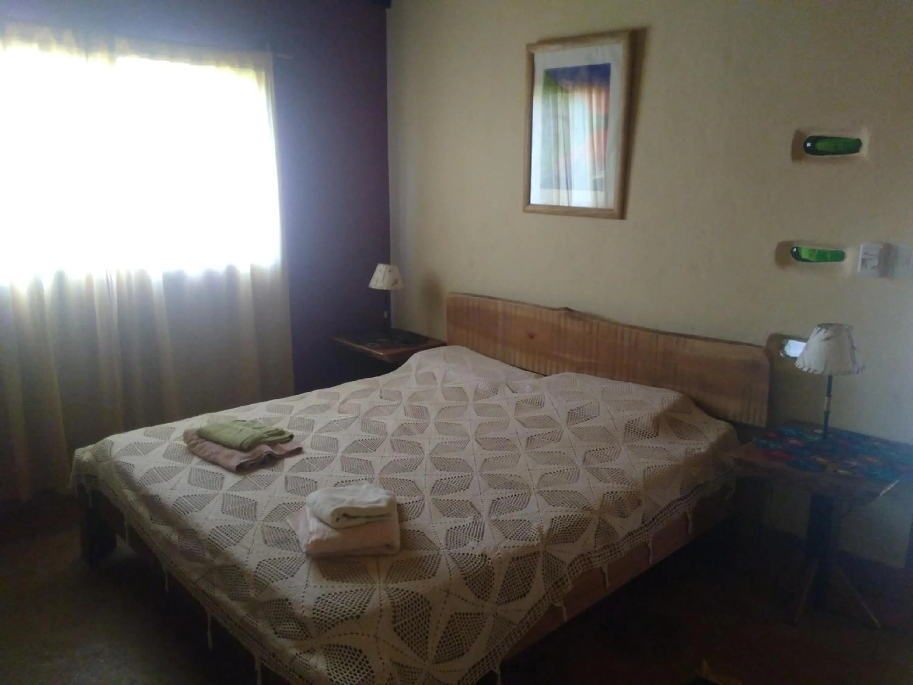 Bed in Granja La Lechuza Ecolodge