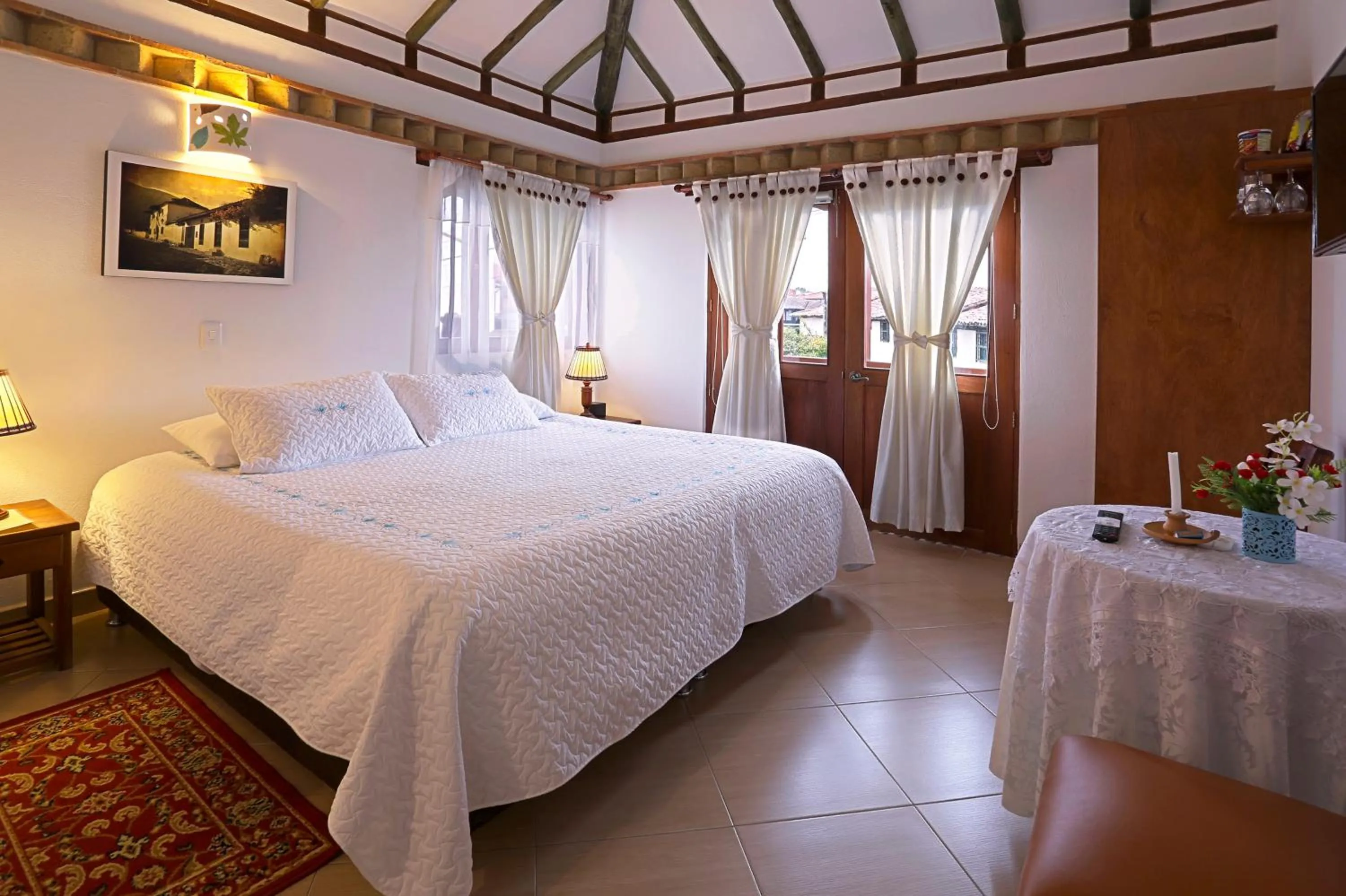 Balcony/Terrace, Bed in Hotel Villa del Angel