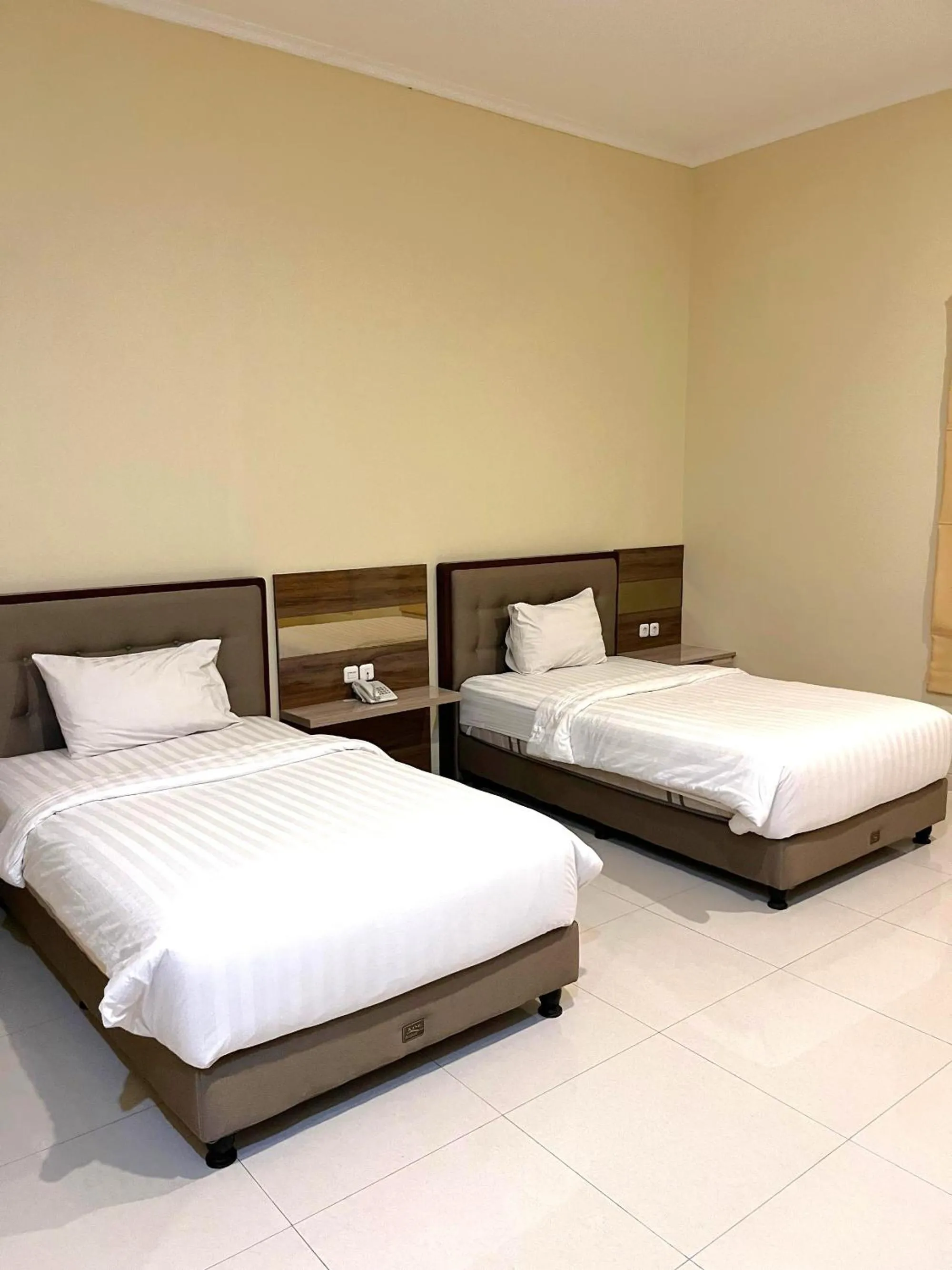 Bed in Alloro Boutique Hotel Pacitan
