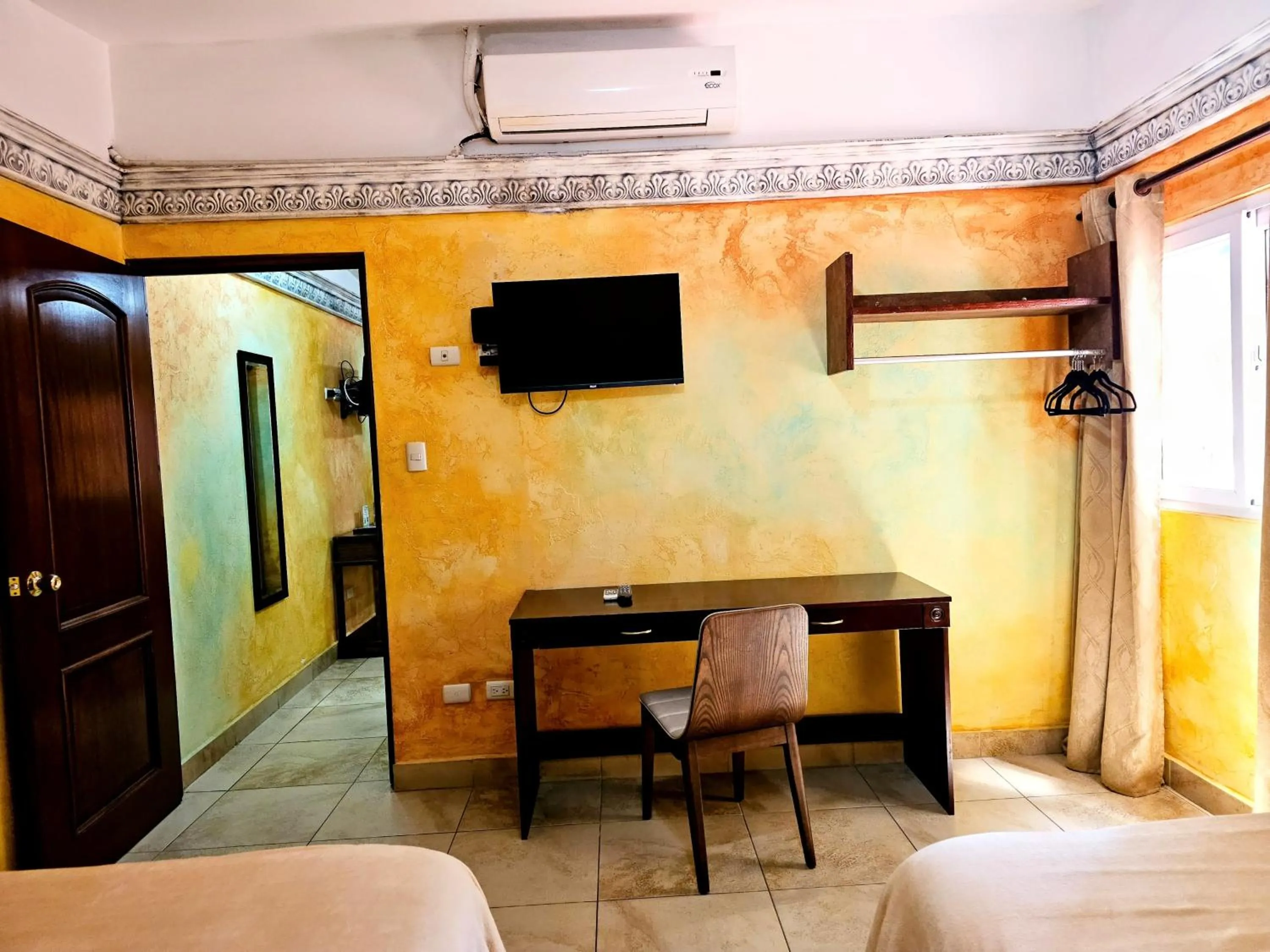 air conditioner, Bed in Antigua Inn Hotel