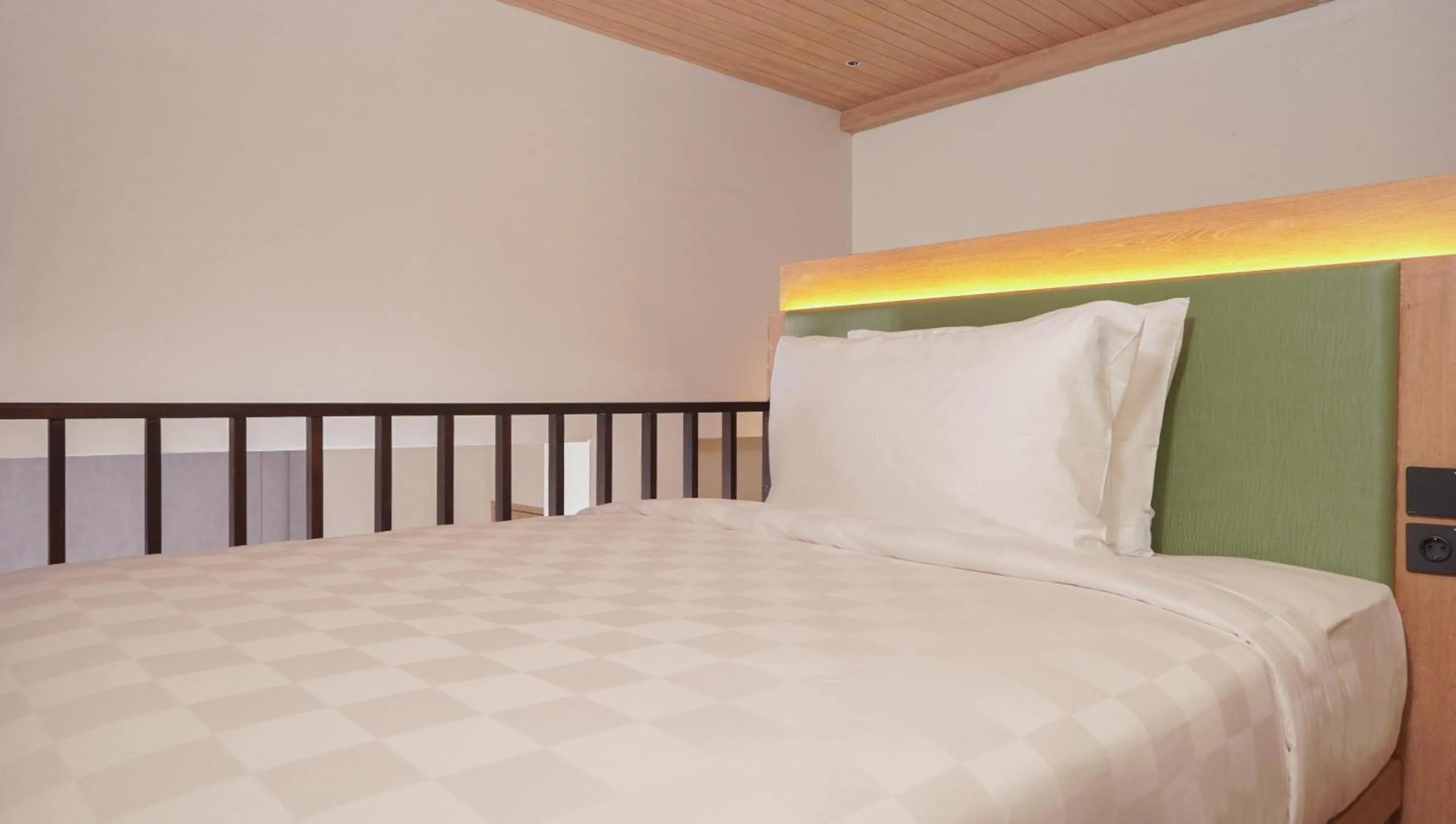 Bed in Jambuluwuk Bromo Resort