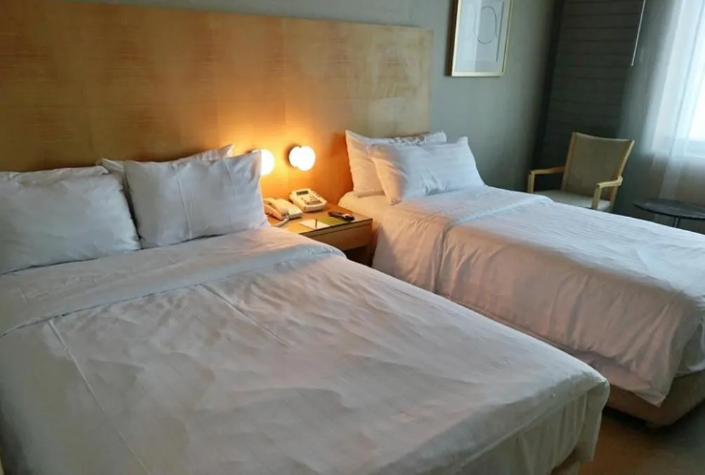Bed in Daegu Grand Hotel