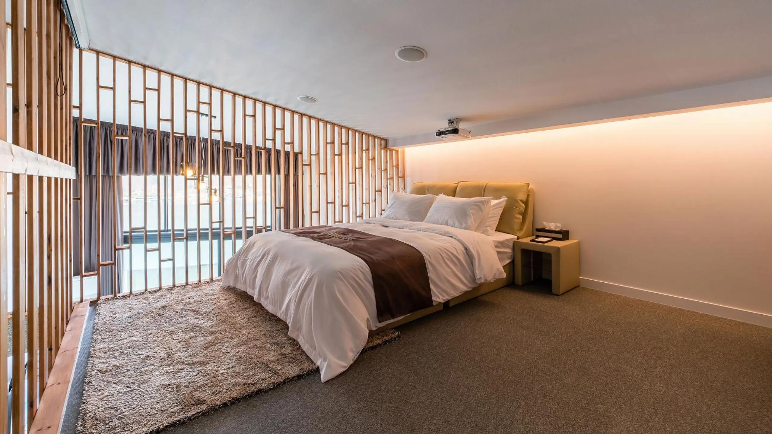 Bed in W Jiwoo Resort