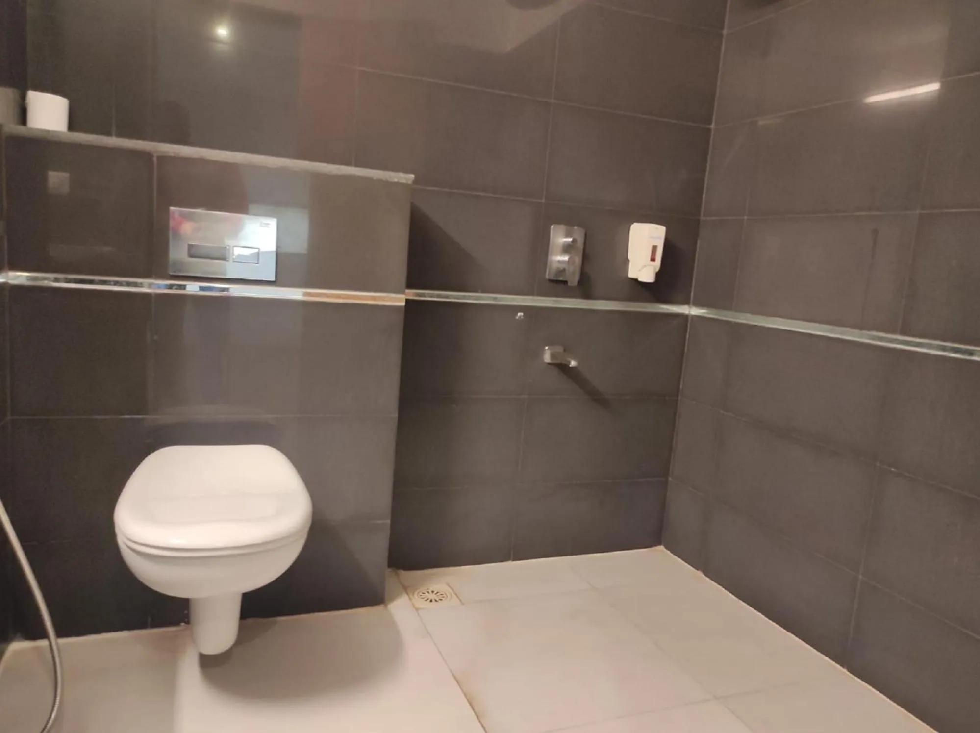 Bathroom in Krishna Inn - Royal Hotels