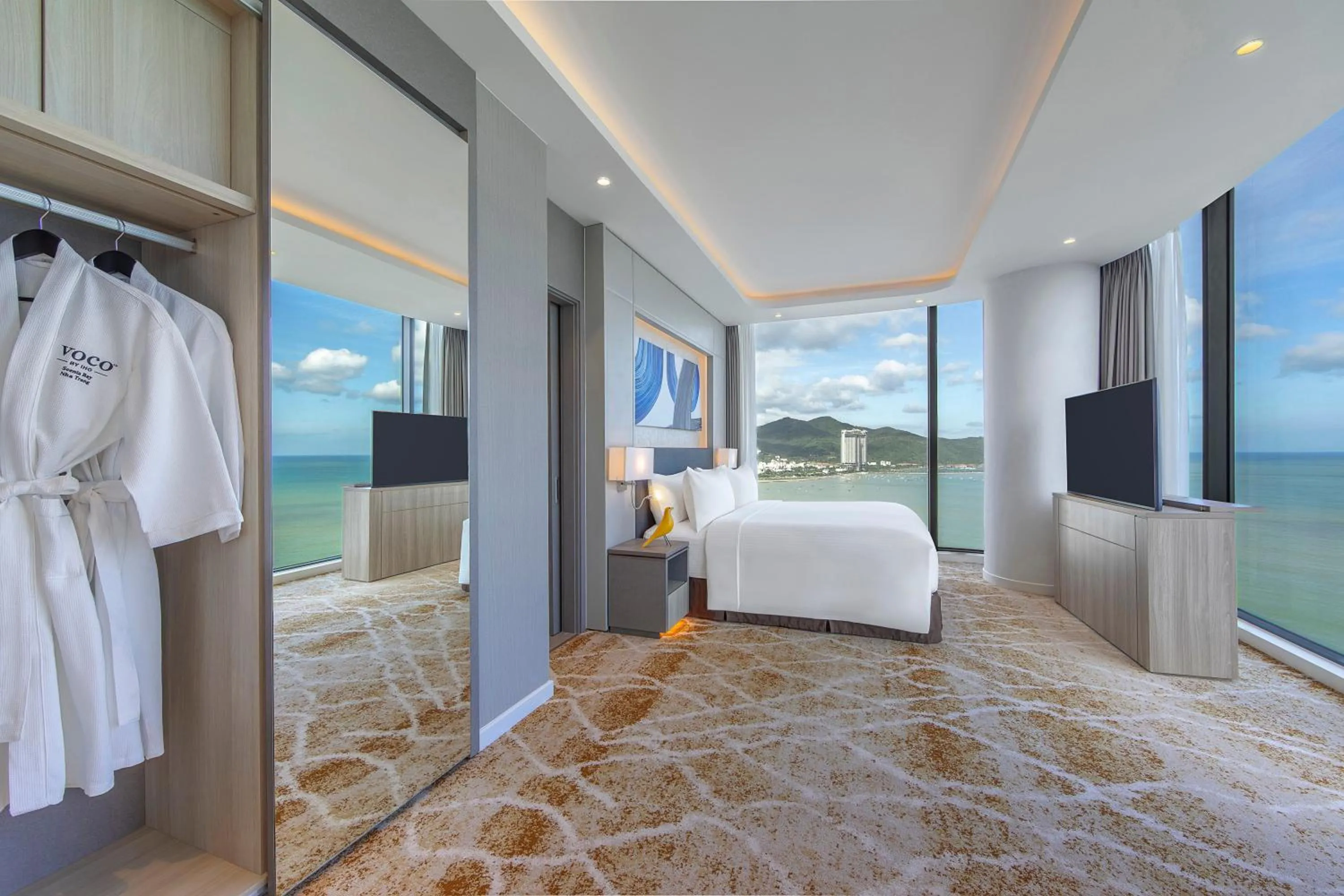 Communal lounge/ TV room, Bed in voco Scenia Bay Nha Trang by IHG