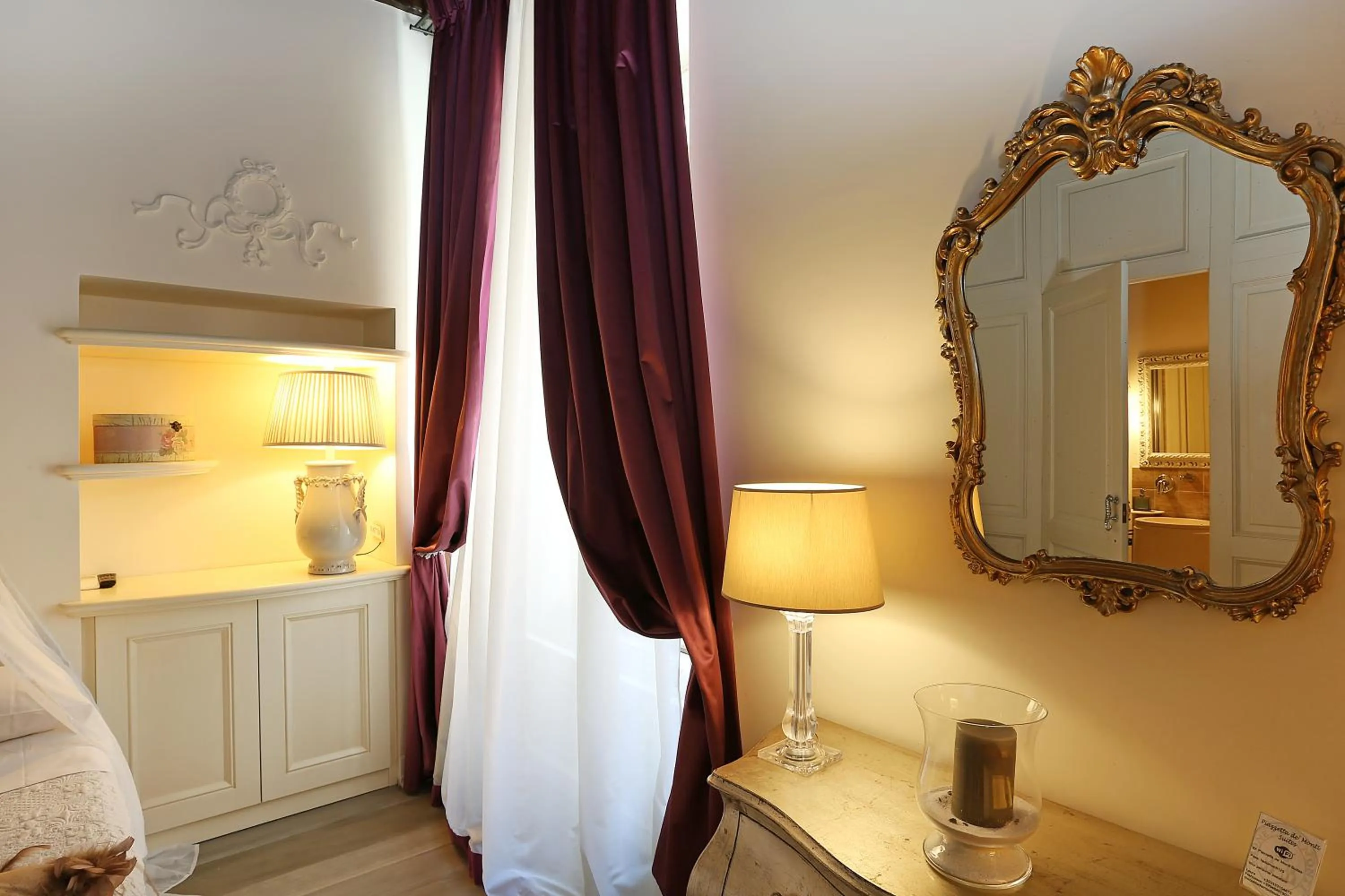 Decorative detail, Bed in Piazzetta de' Monti Suites