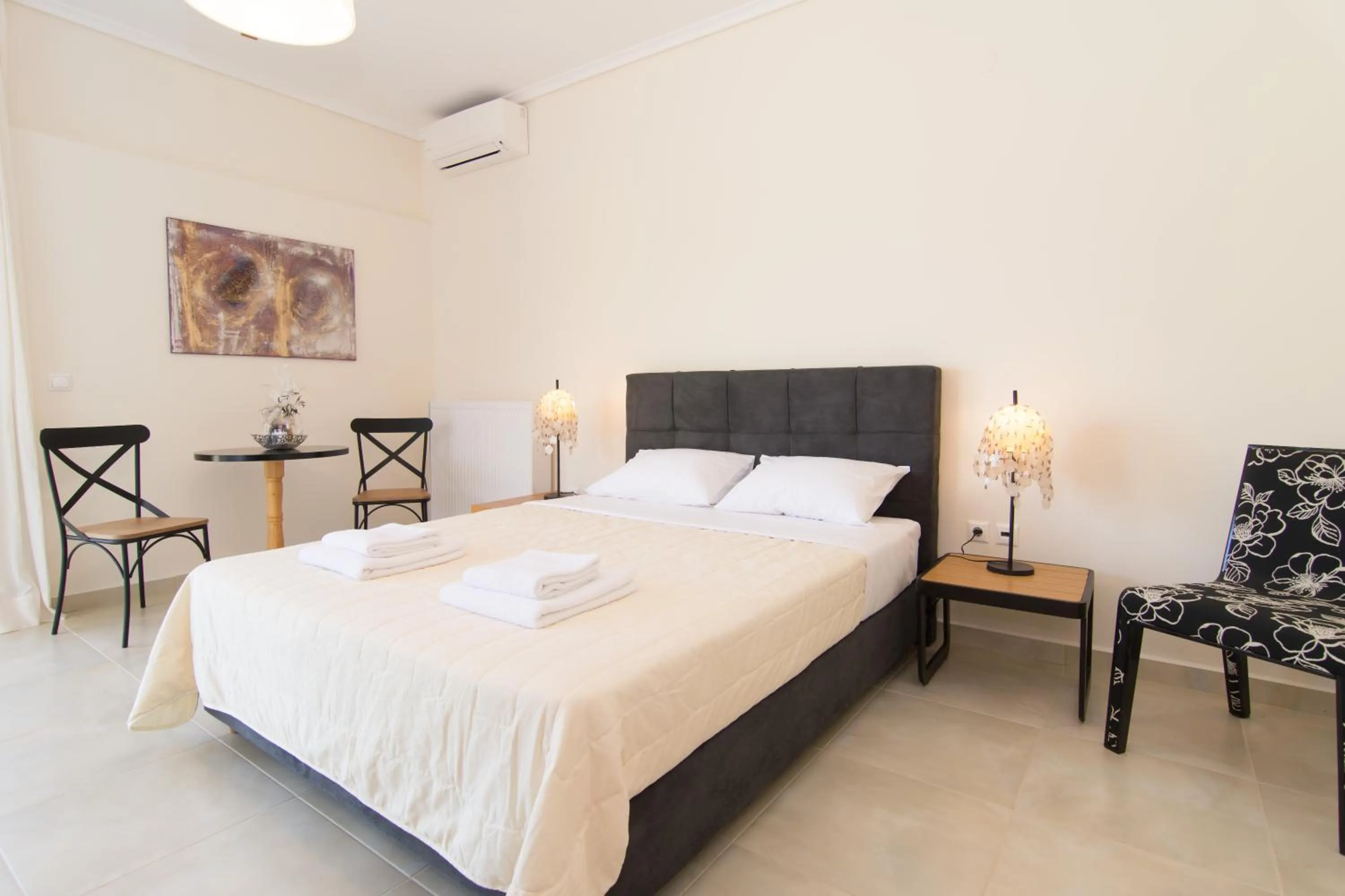 Seating area, Bed in Angelbay Bungalows