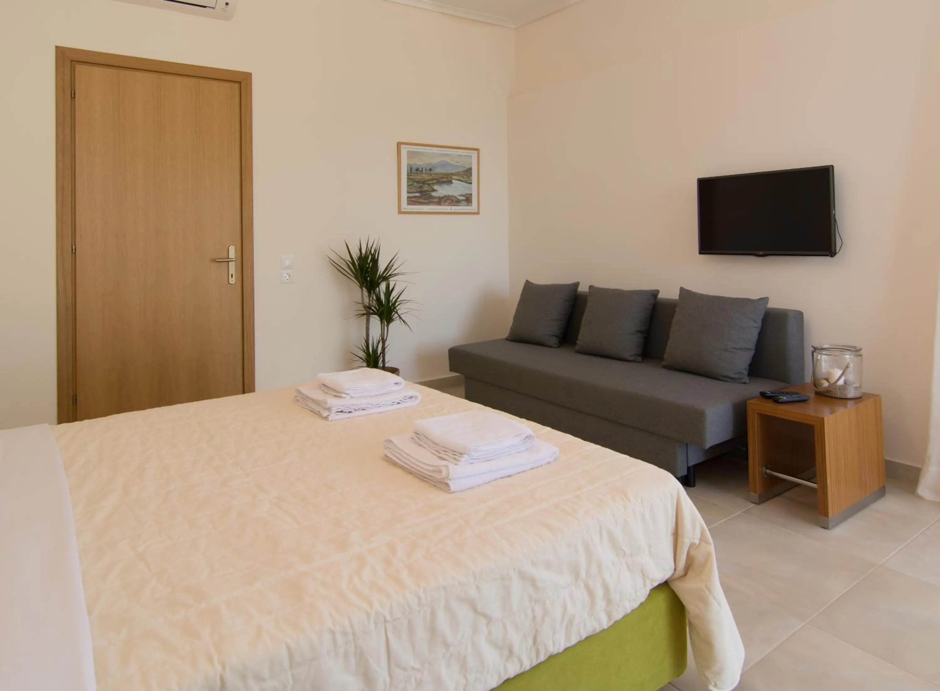 Seating area, Bed in Angelbay Bungalows