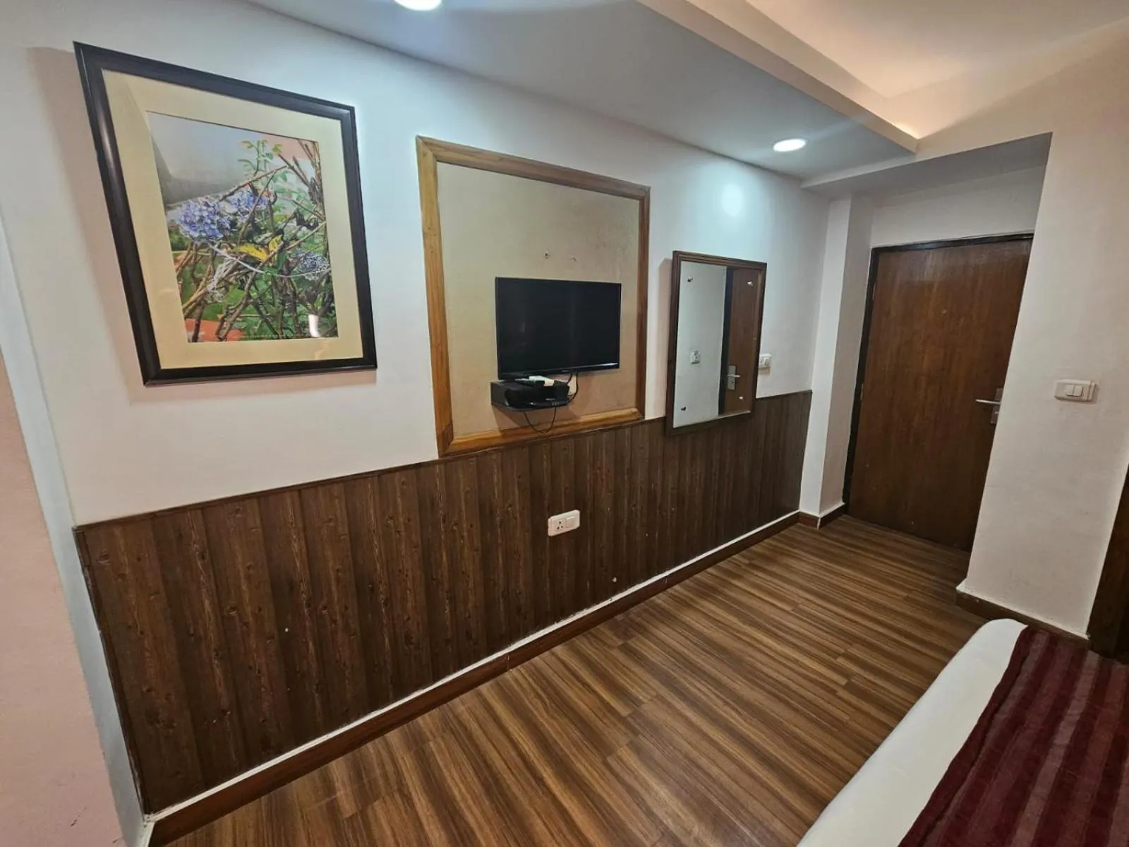 TV and multimedia in Hotel Mayur by RoomsInc Katra