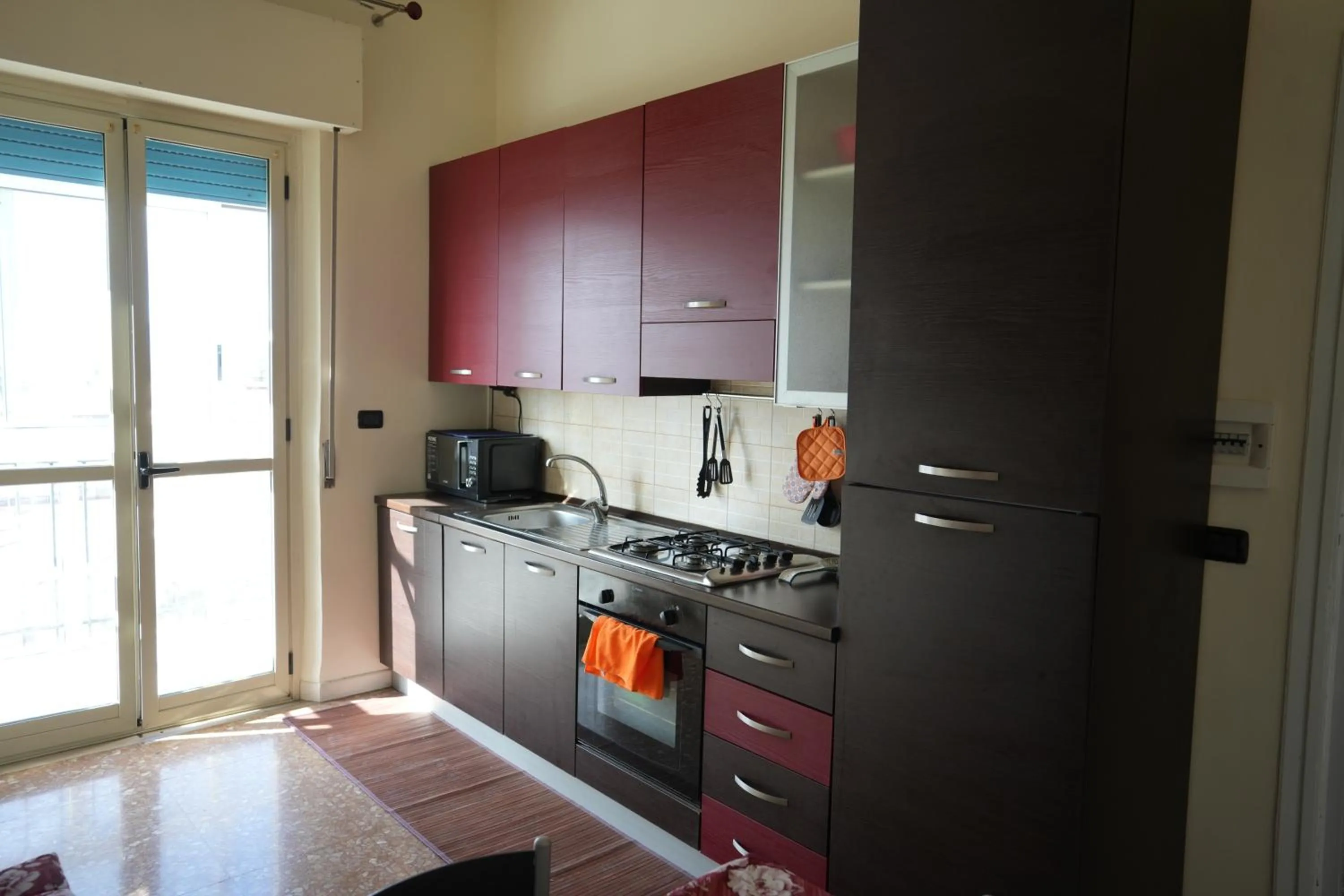 Kitchen or kitchenette in La Regina del Sole