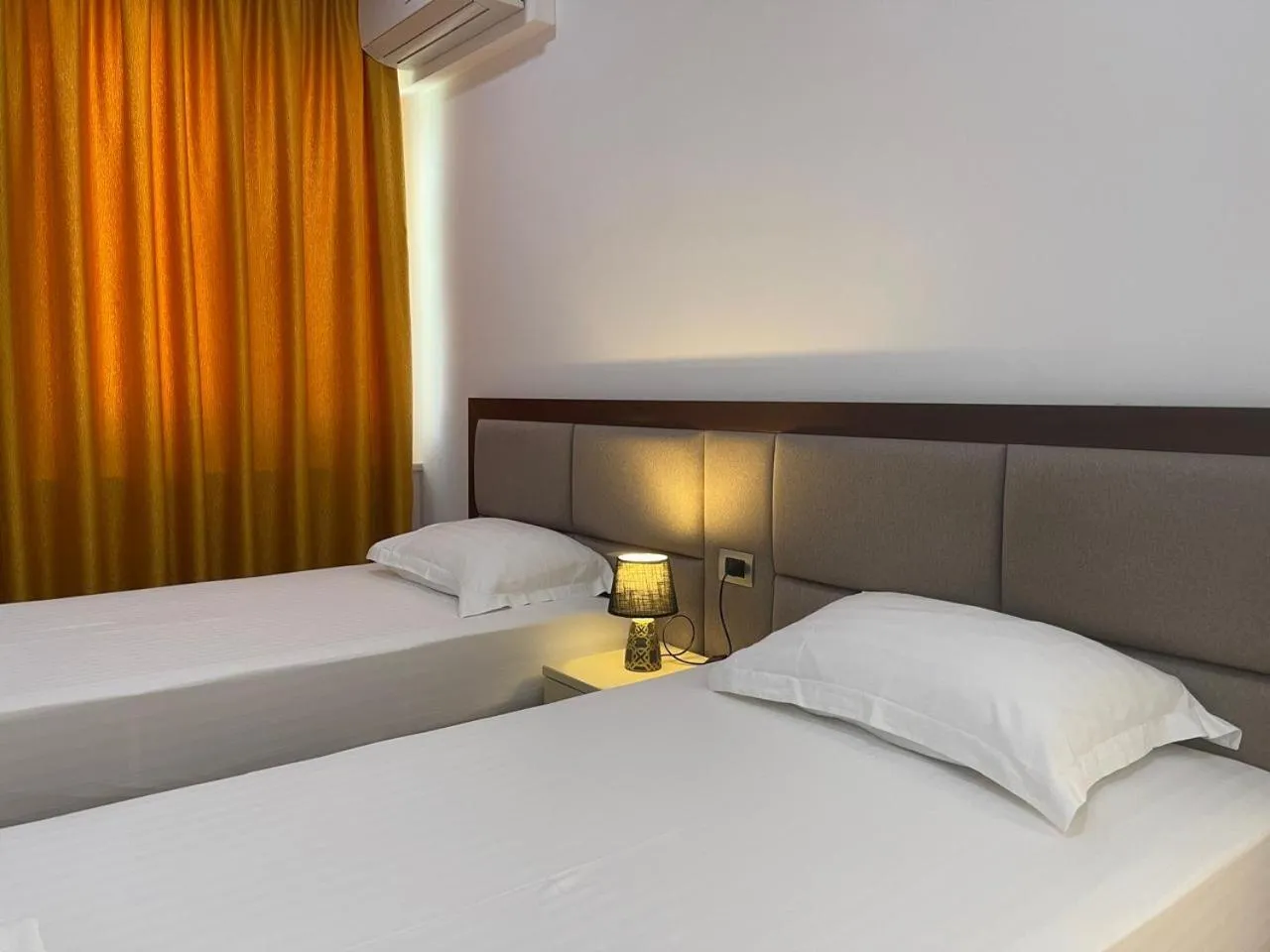 Bedroom in Nemesis Hotel