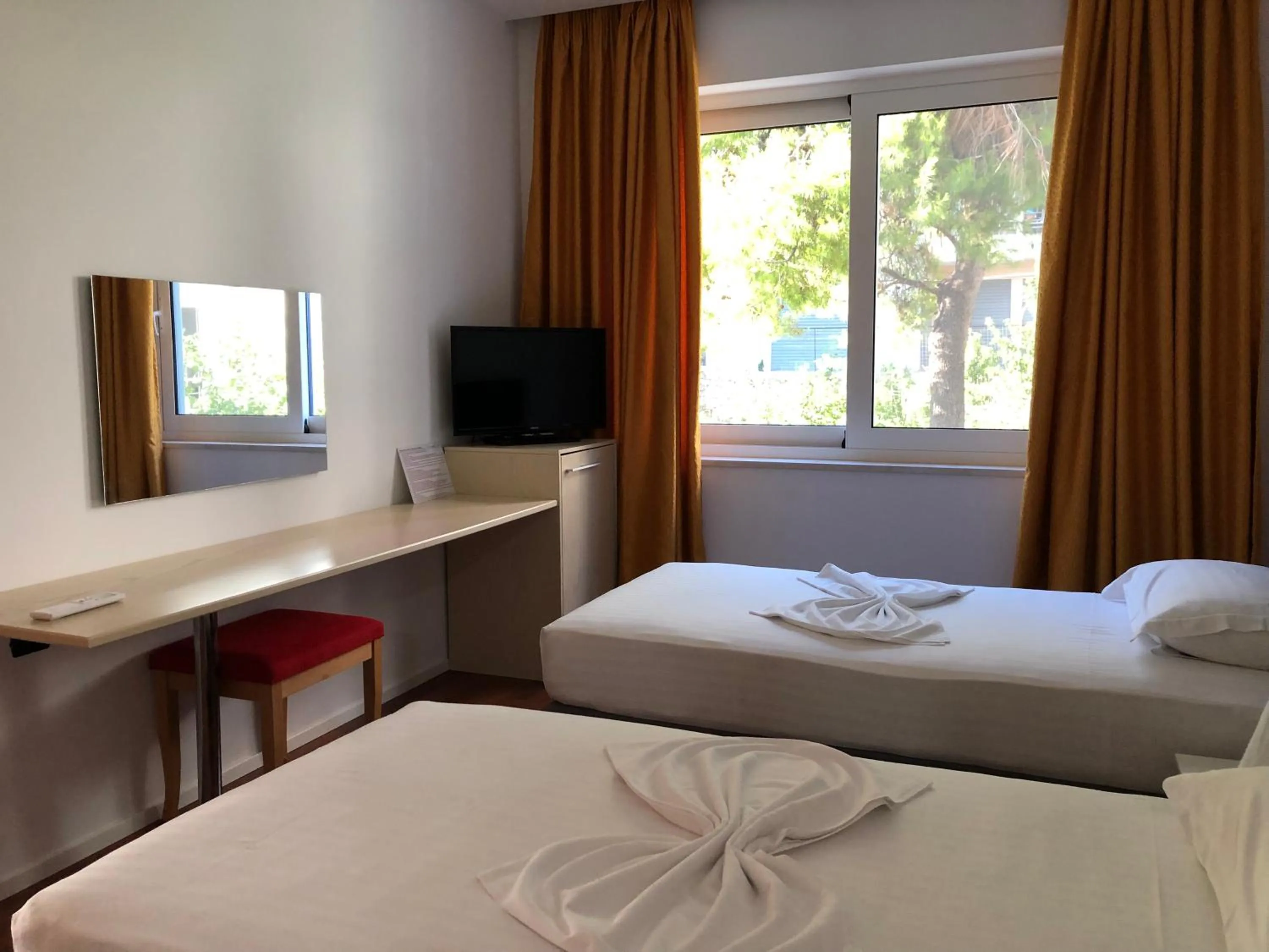 Bed in Nemesis Hotel