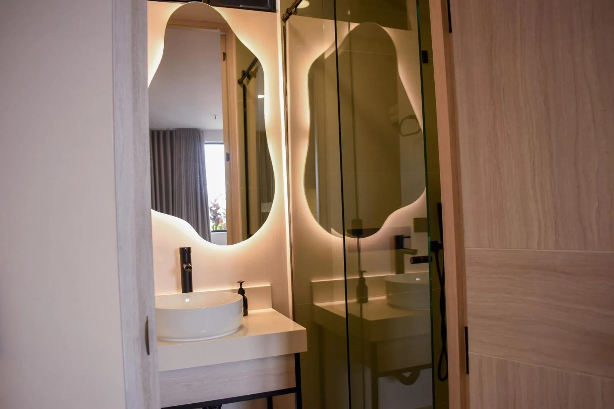 Bathroom in Hotel Ryo 74B Suites by Growing Group