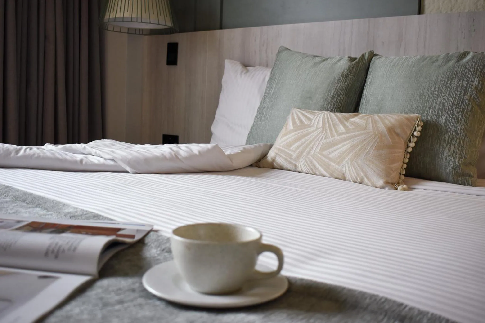 Bed in Hotel Ryo 74B Suites by Growing Group