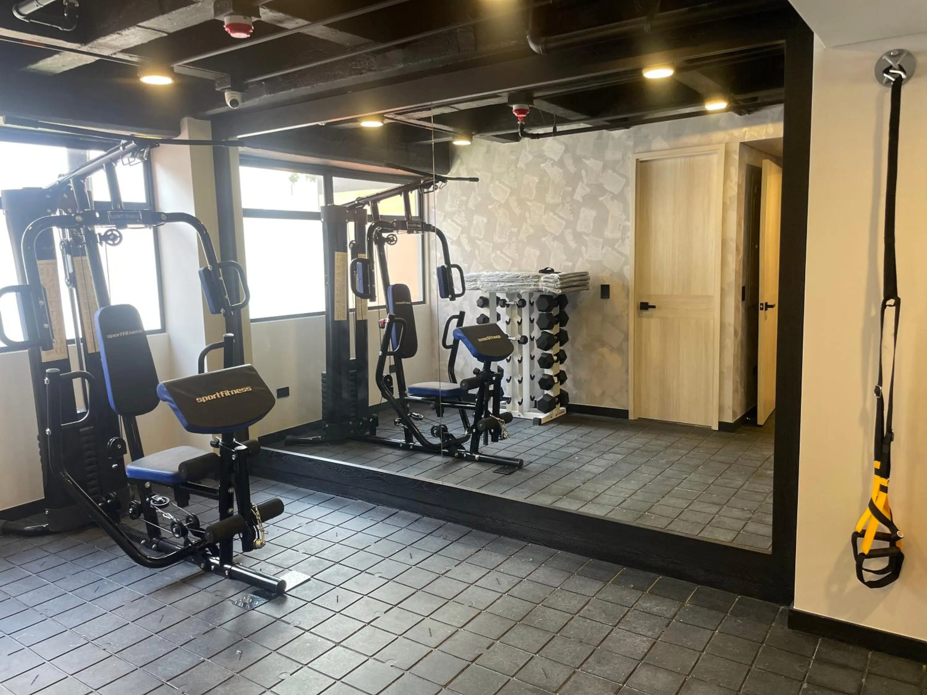 Fitness centre/facilities in Hotel Ryo 74B Suites by Growing Group